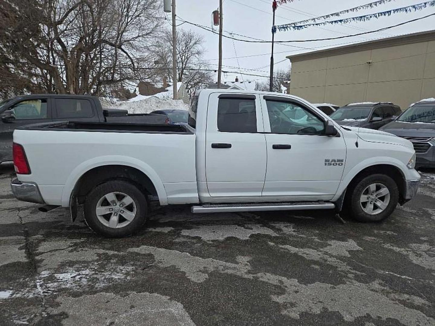 2016 WHITE RAM 1500 Tradesman Quad Cab 4WD (1C6RR7FG8GS) with an 3.6L V6 DOHC 24V FFV engine, 6A transmission, located at 3304 Woodville Road, Northwood, OH, 43619, (419) 210-8019, 41.612694, -83.480743 - Your #1 Destination for Auto Loans and mdash;No Matter Your Credit!At our dealership, we believe everyone deserves the opportunity to drive their dream car and mdash;whether you have good credit, bad credit, or no credit at all. With a wide selection of hundreds of cars, trucks, and SUVs, you'll fin - Photo#5
