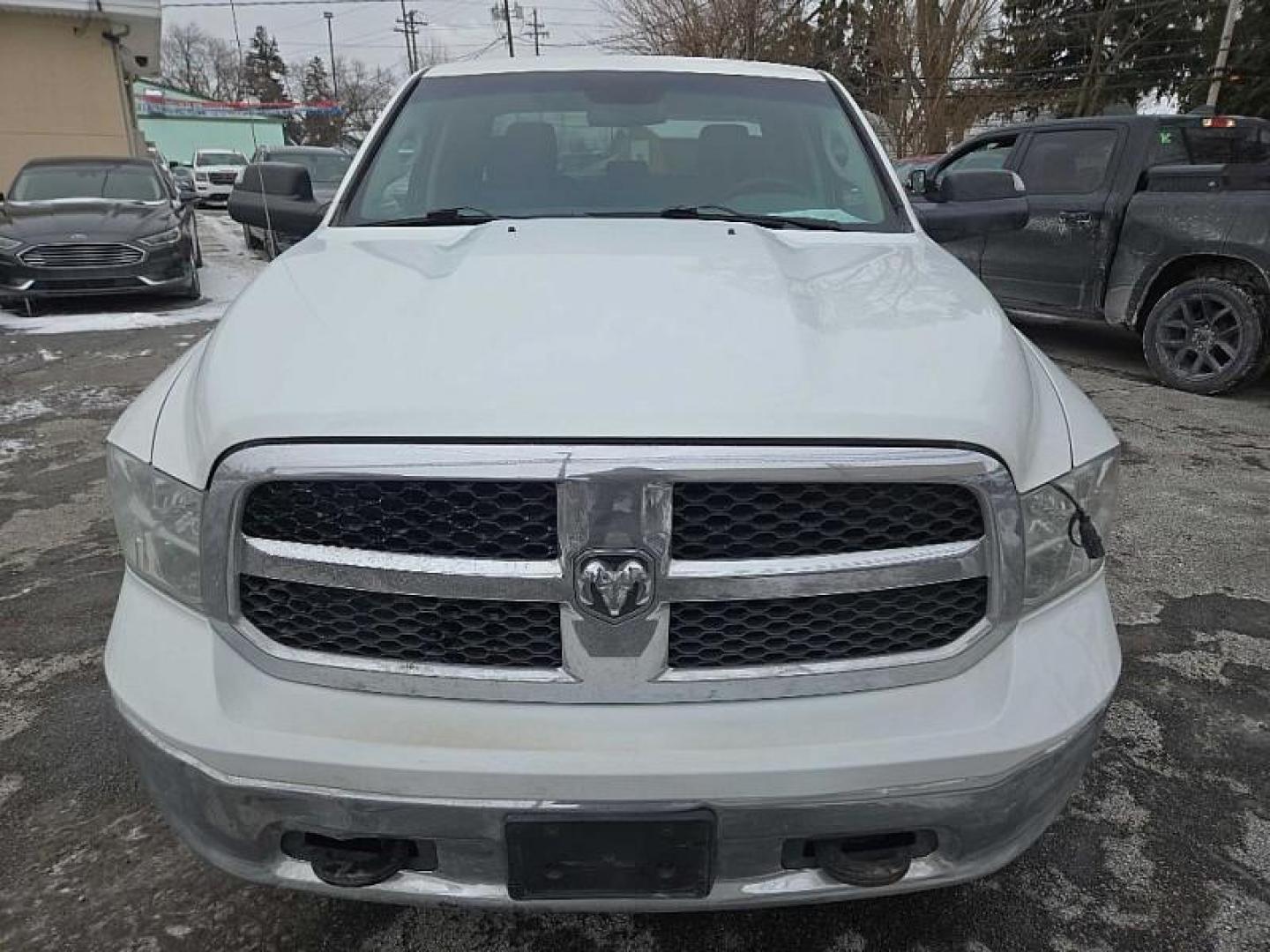 2016 WHITE RAM 1500 Tradesman Quad Cab 4WD (1C6RR7FG8GS) with an 3.6L V6 DOHC 24V FFV engine, 6A transmission, located at 3304 Woodville Road, Northwood, OH, 43619, (419) 210-8019, 41.612694, -83.480743 - Your #1 Destination for Auto Loans and mdash;No Matter Your Credit!At our dealership, we believe everyone deserves the opportunity to drive their dream car and mdash;whether you have good credit, bad credit, or no credit at all. With a wide selection of hundreds of cars, trucks, and SUVs, you'll fin - Photo#7