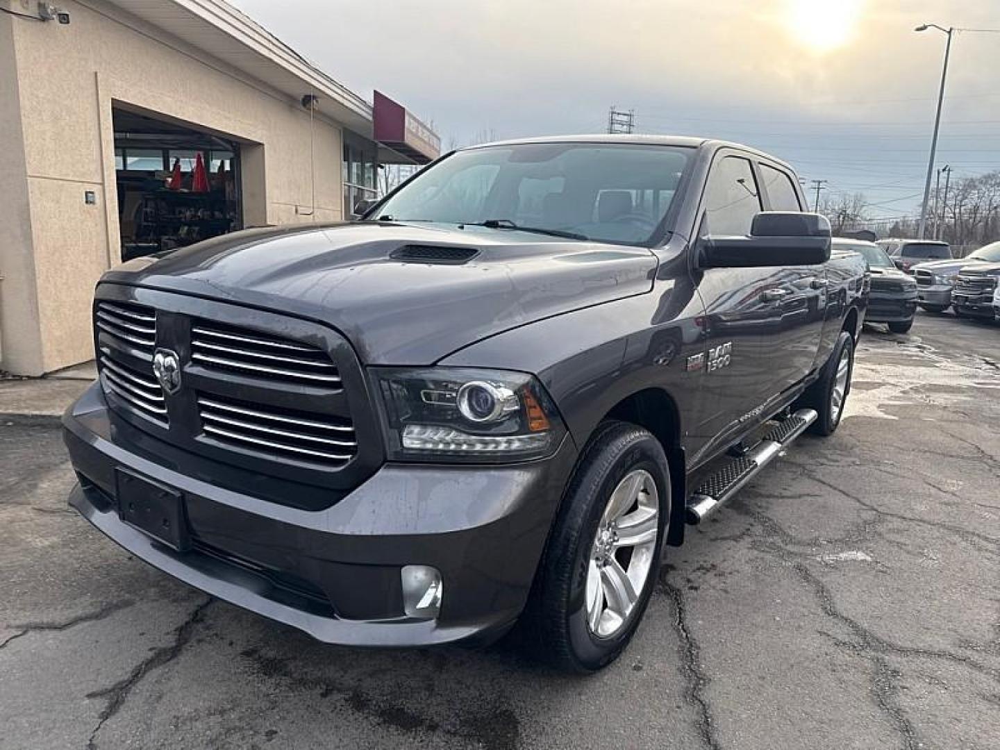 2016 GRAY /BLACK RAM 1500 Sport Crew Cab LWB 4WD (1C6RR7UT7GS) with an 5.7L V8 OHV 16V engine, 6A transmission, located at 3304 Woodville Road, Northwood, OH, 43619, (419) 210-8019, 41.612694, -83.480743 - Your #1 Destination for Auto Loans and mdash;No Matter Your Credit!At our dealership, we believe everyone deserves the opportunity to drive their dream car and mdash;whether you have good credit, bad credit, or no credit at all. With a wide selection of hundreds of cars, trucks, and SUVs, you'll fin - Photo#0