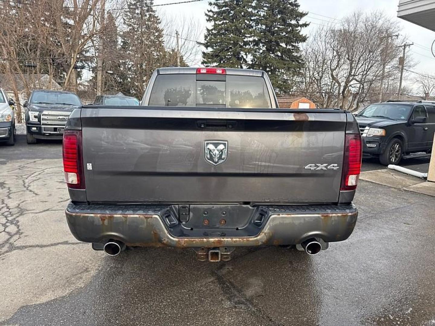 2016 GRAY /BLACK RAM 1500 Sport Crew Cab LWB 4WD (1C6RR7UT7GS) with an 5.7L V8 OHV 16V engine, 6A transmission, located at 3304 Woodville Road, Northwood, OH, 43619, (419) 210-8019, 41.612694, -83.480743 - Your #1 Destination for Auto Loans and mdash;No Matter Your Credit!At our dealership, we believe everyone deserves the opportunity to drive their dream car and mdash;whether you have good credit, bad credit, or no credit at all. With a wide selection of hundreds of cars, trucks, and SUVs, you'll fin - Photo#3
