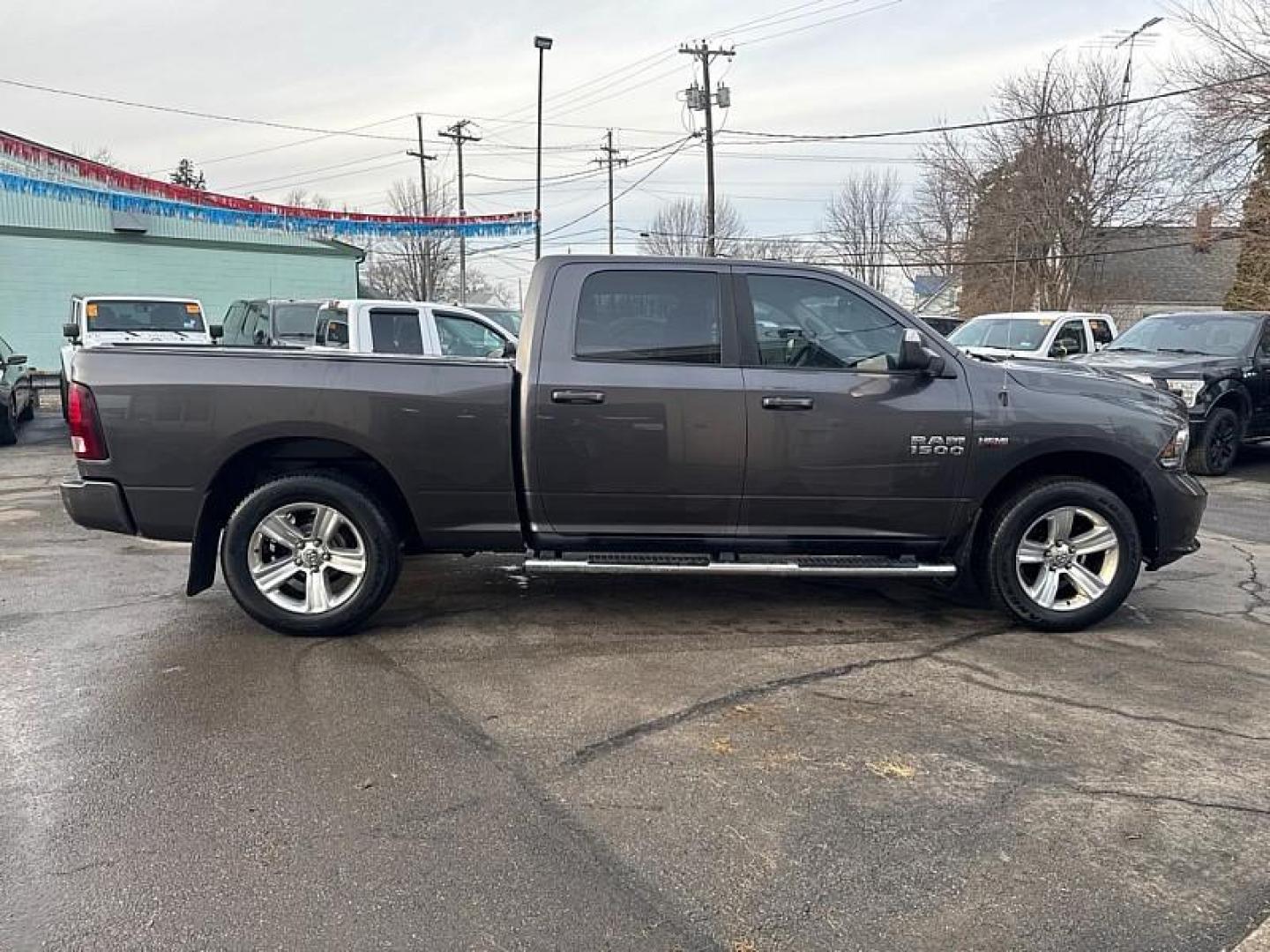 2016 GRAY /BLACK RAM 1500 Sport Crew Cab LWB 4WD (1C6RR7UT7GS) with an 5.7L V8 OHV 16V engine, 6A transmission, located at 3304 Woodville Road, Northwood, OH, 43619, (419) 210-8019, 41.612694, -83.480743 - Your #1 Destination for Auto Loans and mdash;No Matter Your Credit!At our dealership, we believe everyone deserves the opportunity to drive their dream car and mdash;whether you have good credit, bad credit, or no credit at all. With a wide selection of hundreds of cars, trucks, and SUVs, you'll fin - Photo#5