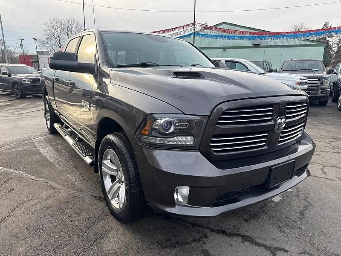2016 GRAY /BLACK RAM 1500 Sport Crew Cab LWB 4WD (1C6RR7UT7GS) with an 5.7L V8 OHV 16V engine, 6A transmission, located at 3304 Woodville Road, Northwood, OH, 43619, (419) 210-8019, 41.612694, -83.480743 - Your #1 Destination for Auto Loans and mdash;No Matter Your Credit!At our dealership, we believe everyone deserves the opportunity to drive their dream car and mdash;whether you have good credit, bad credit, or no credit at all. With a wide selection of hundreds of cars, trucks, and SUVs, you'll fin - Photo#6