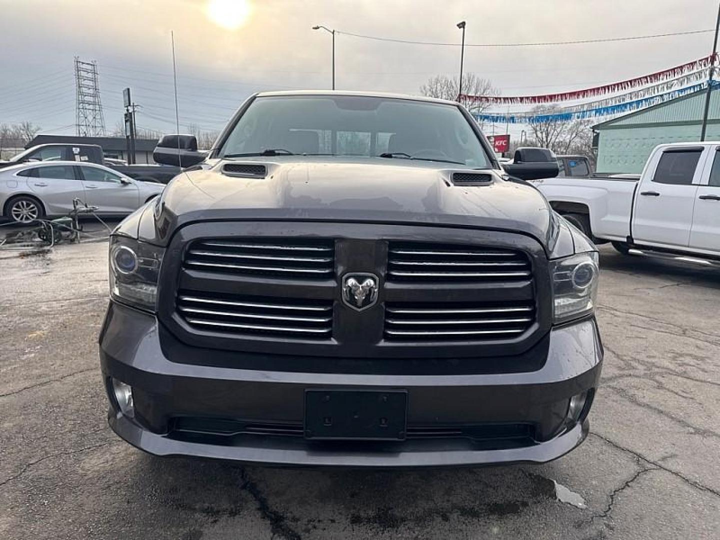 2016 GRAY /BLACK RAM 1500 Sport Crew Cab LWB 4WD (1C6RR7UT7GS) with an 5.7L V8 OHV 16V engine, 6A transmission, located at 3304 Woodville Road, Northwood, OH, 43619, (419) 210-8019, 41.612694, -83.480743 - Your #1 Destination for Auto Loans and mdash;No Matter Your Credit!At our dealership, we believe everyone deserves the opportunity to drive their dream car and mdash;whether you have good credit, bad credit, or no credit at all. With a wide selection of hundreds of cars, trucks, and SUVs, you'll fin - Photo#7