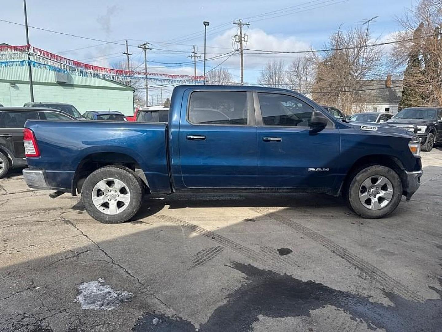 2019 BLUE /BLACK RAM 1500 Big Horn Crew Cab SWB 4WD (1C6RRFFG7KN) with an 3.6L V6 DOHC 24V engine, 8A transmission, located at 3304 Woodville Road, Northwood, OH, 43619, (419) 210-8019, 41.612694, -83.480743 - Your #1 Destination for Auto Loans and mdash;No Matter Your Credit!At our dealership, we believe everyone deserves the opportunity to drive their dream car and mdash;whether you have good credit, bad credit, or no credit at all. With a wide selection of hundreds of cars, trucks, and SUVs, you'll fin - Photo#5
