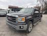 2015 GRAY GMC Sierra 1500 SLT Crew Cab Long Box 4WD (3GTU2VEC1FG) with an 5.3L V8 OHV 16V engine, 6-Speed Automatic transmission, located at 3304 Woodville Road, Northwood, OH, 43619, (419) 210-8019, 41.612694, -83.480743 - Your #1 Destination for Auto Loans and mdash;No Matter Your Credit!At our dealership, we believe everyone deserves the opportunity to drive their dream car and mdash;whether you have good credit, bad credit, or no credit at all. With a wide selection of hundreds of cars, trucks, and SUVs, you'll fin - Photo#0