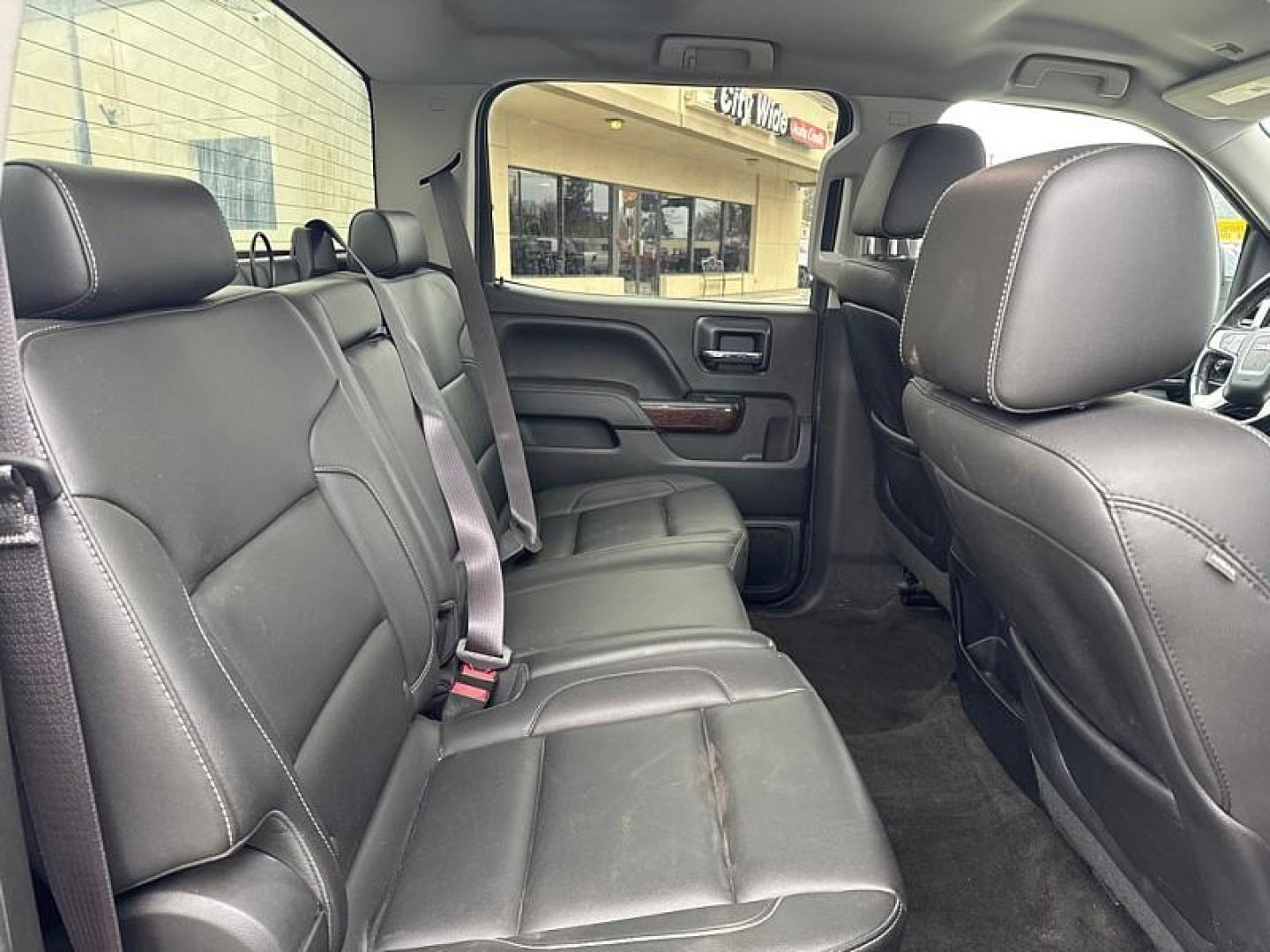 2015 GRAY GMC Sierra 1500 SLT Crew Cab Long Box 4WD (3GTU2VEC1FG) with an 5.3L V8 OHV 16V engine, 6-Speed Automatic transmission, located at 3304 Woodville Road, Northwood, OH, 43619, (419) 210-8019, 41.612694, -83.480743 - Your #1 Destination for Auto Loans and mdash;No Matter Your Credit!At our dealership, we believe everyone deserves the opportunity to drive their dream car and mdash;whether you have good credit, bad credit, or no credit at all. With a wide selection of hundreds of cars, trucks, and SUVs, you'll fin - Photo#13