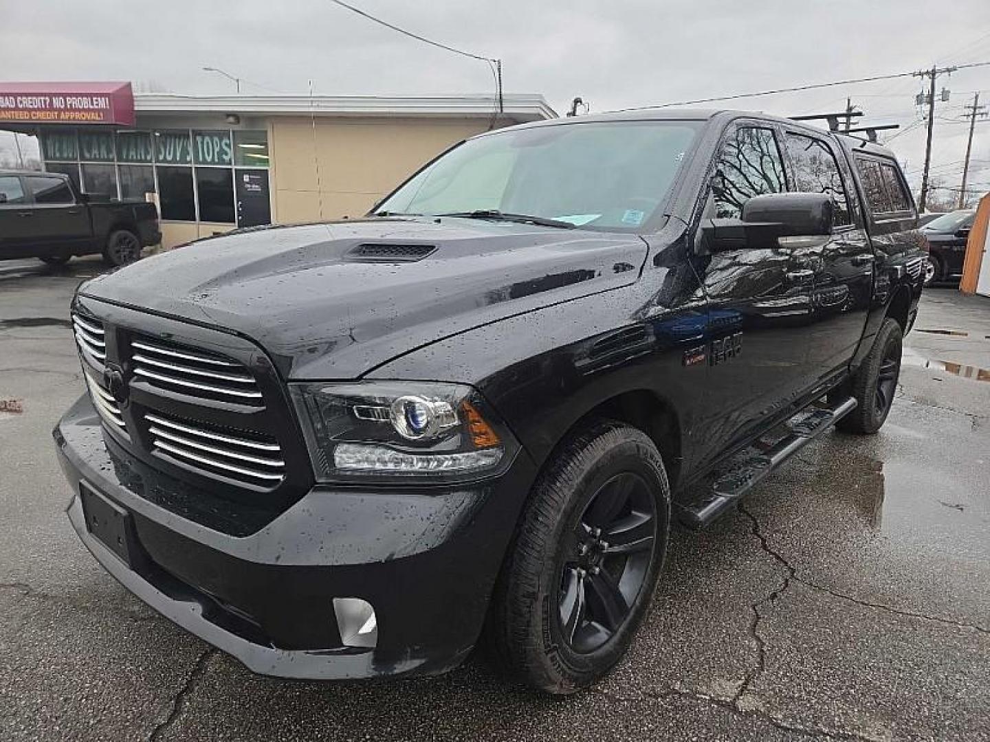 2016 BLACK /BLACK RAM 1500 Sport Crew Cab SWB 4WD (1C6RR7MT0GS) with an 5.7L V8 OHV 16V engine, 6A transmission, located at 3304 Woodville Road, Northwood, OH, 43619, (419) 210-8019, 41.612694, -83.480743 - Your #1 Destination for Auto Loans and mdash;No Matter Your Credit!At our dealership, we believe everyone deserves the opportunity to drive their dream car and mdash;whether you have good credit, bad credit, or no credit at all. With a wide selection of hundreds of cars, trucks, and SUVs, you'll fin - Photo#0