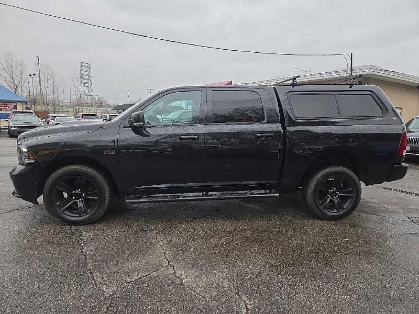 2016 BLACK /BLACK RAM 1500 Sport Crew Cab SWB 4WD (1C6RR7MT0GS) with an 5.7L V8 OHV 16V engine, 6A transmission, located at 3304 Woodville Road, Northwood, OH, 43619, (419) 210-8019, 41.612694, -83.480743 - Your #1 Destination for Auto Loans and mdash;No Matter Your Credit!At our dealership, we believe everyone deserves the opportunity to drive their dream car and mdash;whether you have good credit, bad credit, or no credit at all. With a wide selection of hundreds of cars, trucks, and SUVs, you'll fin - Photo#1