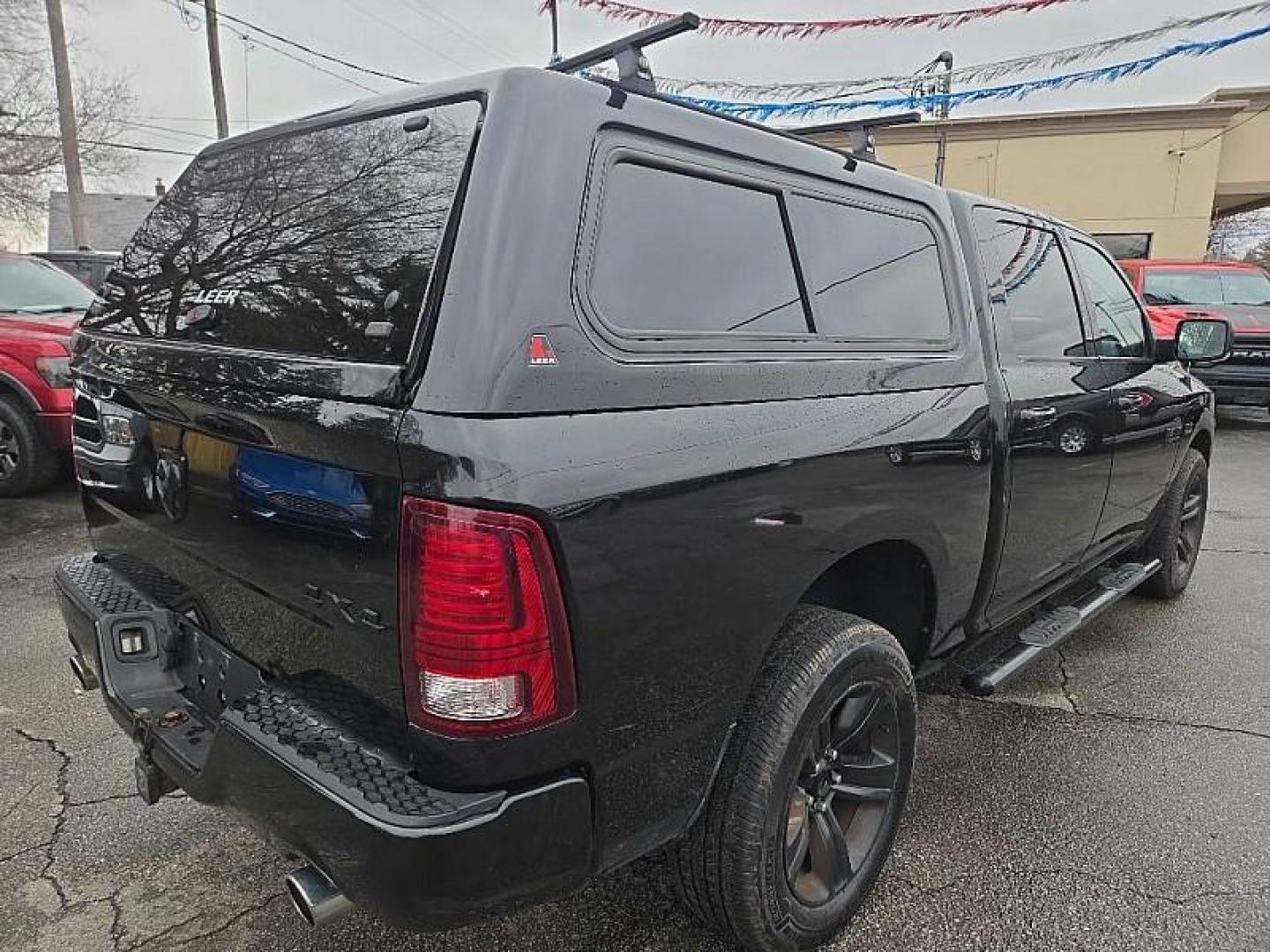 2016 BLACK /BLACK RAM 1500 Sport Crew Cab SWB 4WD (1C6RR7MT0GS) with an 5.7L V8 OHV 16V engine, 6A transmission, located at 3304 Woodville Road, Northwood, OH, 43619, (419) 210-8019, 41.612694, -83.480743 - Your #1 Destination for Auto Loans and mdash;No Matter Your Credit!At our dealership, we believe everyone deserves the opportunity to drive their dream car and mdash;whether you have good credit, bad credit, or no credit at all. With a wide selection of hundreds of cars, trucks, and SUVs, you'll fin - Photo#4
