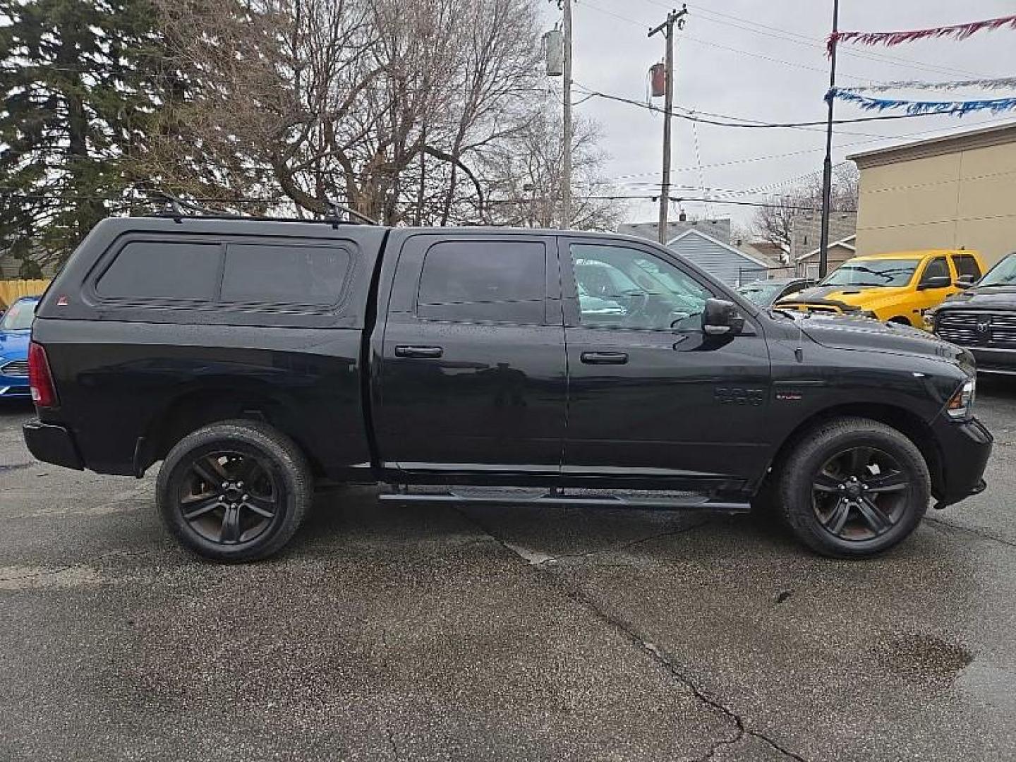 2016 BLACK /BLACK RAM 1500 Sport Crew Cab SWB 4WD (1C6RR7MT0GS) with an 5.7L V8 OHV 16V engine, 6A transmission, located at 3304 Woodville Road, Northwood, OH, 43619, (419) 210-8019, 41.612694, -83.480743 - Your #1 Destination for Auto Loans and mdash;No Matter Your Credit!At our dealership, we believe everyone deserves the opportunity to drive their dream car and mdash;whether you have good credit, bad credit, or no credit at all. With a wide selection of hundreds of cars, trucks, and SUVs, you'll fin - Photo#5