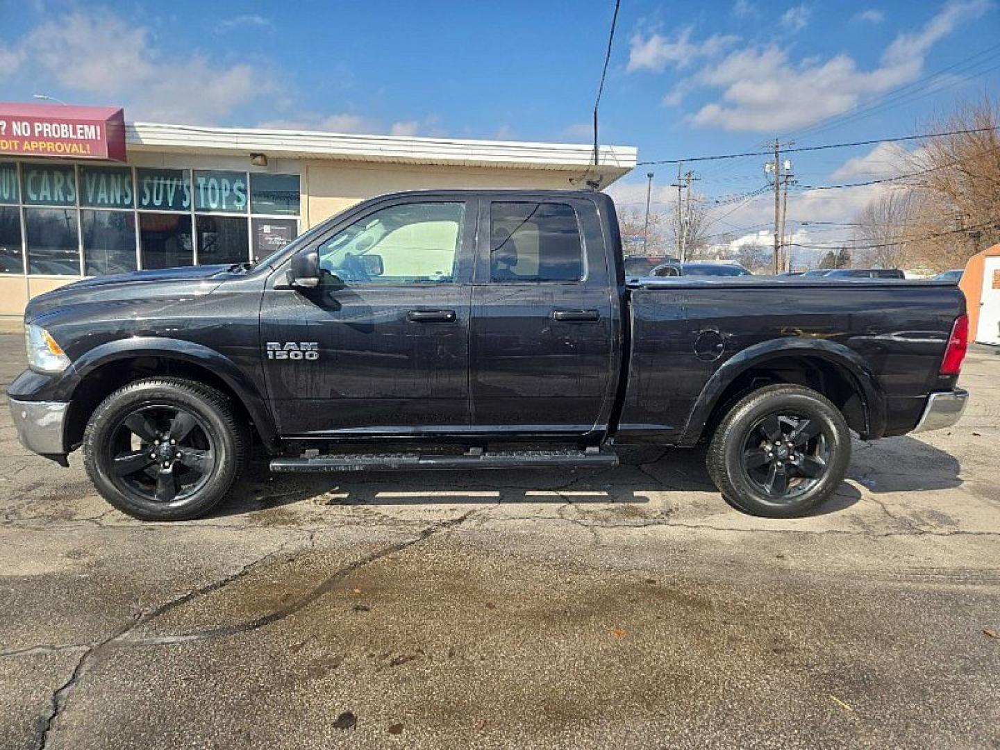 2017 BLACK /GRAY RAM 1500 SLT Quad Cab 4WD (1C6RR7GG1HS) with an 3.6L V6 DOHC 24V FFV engine, 8A transmission, located at 3304 Woodville Road, Northwood, OH, 43619, (419) 210-8019, 41.612694, -83.480743 - Your #1 Destination for Auto Loans and mdash;No Matter Your Credit!At our dealership, we believe everyone deserves the opportunity to drive their dream car and mdash;whether you have good credit, bad credit, or no credit at all. With a wide selection of hundreds of cars, trucks, and SUVs, you'll fin - Photo#1