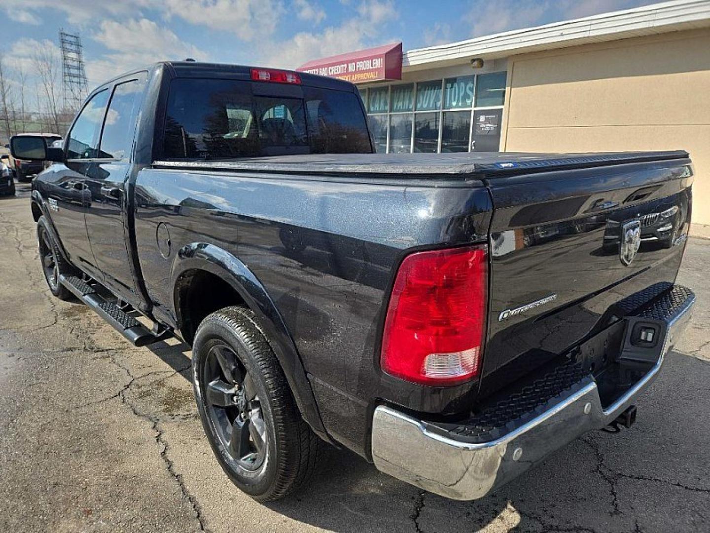 2017 BLACK /GRAY RAM 1500 SLT Quad Cab 4WD (1C6RR7GG1HS) with an 3.6L V6 DOHC 24V FFV engine, 8A transmission, located at 3304 Woodville Road, Northwood, OH, 43619, (419) 210-8019, 41.612694, -83.480743 - Your #1 Destination for Auto Loans and mdash;No Matter Your Credit!At our dealership, we believe everyone deserves the opportunity to drive their dream car and mdash;whether you have good credit, bad credit, or no credit at all. With a wide selection of hundreds of cars, trucks, and SUVs, you'll fin - Photo#2