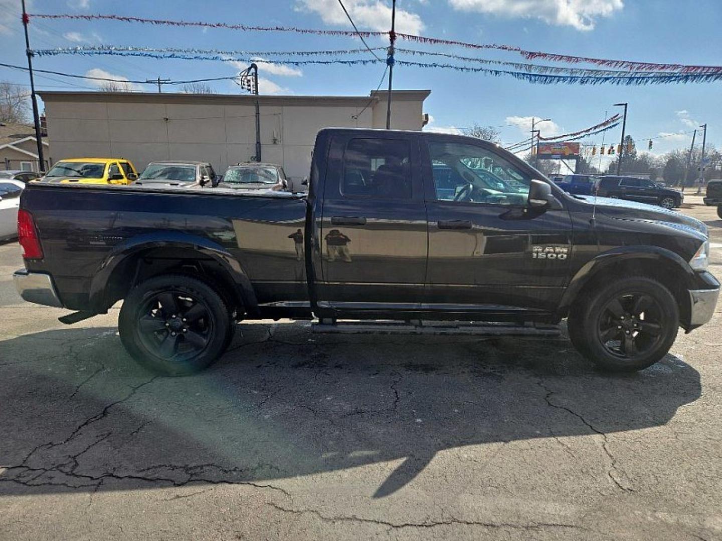2017 BLACK /GRAY RAM 1500 SLT Quad Cab 4WD (1C6RR7GG1HS) with an 3.6L V6 DOHC 24V FFV engine, 8A transmission, located at 3304 Woodville Road, Northwood, OH, 43619, (419) 210-8019, 41.612694, -83.480743 - Your #1 Destination for Auto Loans and mdash;No Matter Your Credit!At our dealership, we believe everyone deserves the opportunity to drive their dream car and mdash;whether you have good credit, bad credit, or no credit at all. With a wide selection of hundreds of cars, trucks, and SUVs, you'll fin - Photo#5