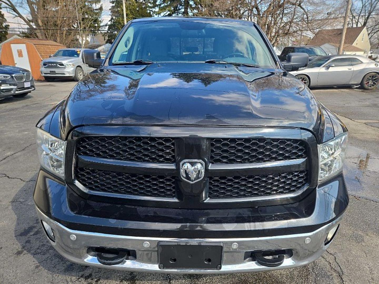 2017 BLACK /GRAY RAM 1500 SLT Quad Cab 4WD (1C6RR7GG1HS) with an 3.6L V6 DOHC 24V FFV engine, 8A transmission, located at 3304 Woodville Road, Northwood, OH, 43619, (419) 210-8019, 41.612694, -83.480743 - Your #1 Destination for Auto Loans and mdash;No Matter Your Credit!At our dealership, we believe everyone deserves the opportunity to drive their dream car and mdash;whether you have good credit, bad credit, or no credit at all. With a wide selection of hundreds of cars, trucks, and SUVs, you'll fin - Photo#7