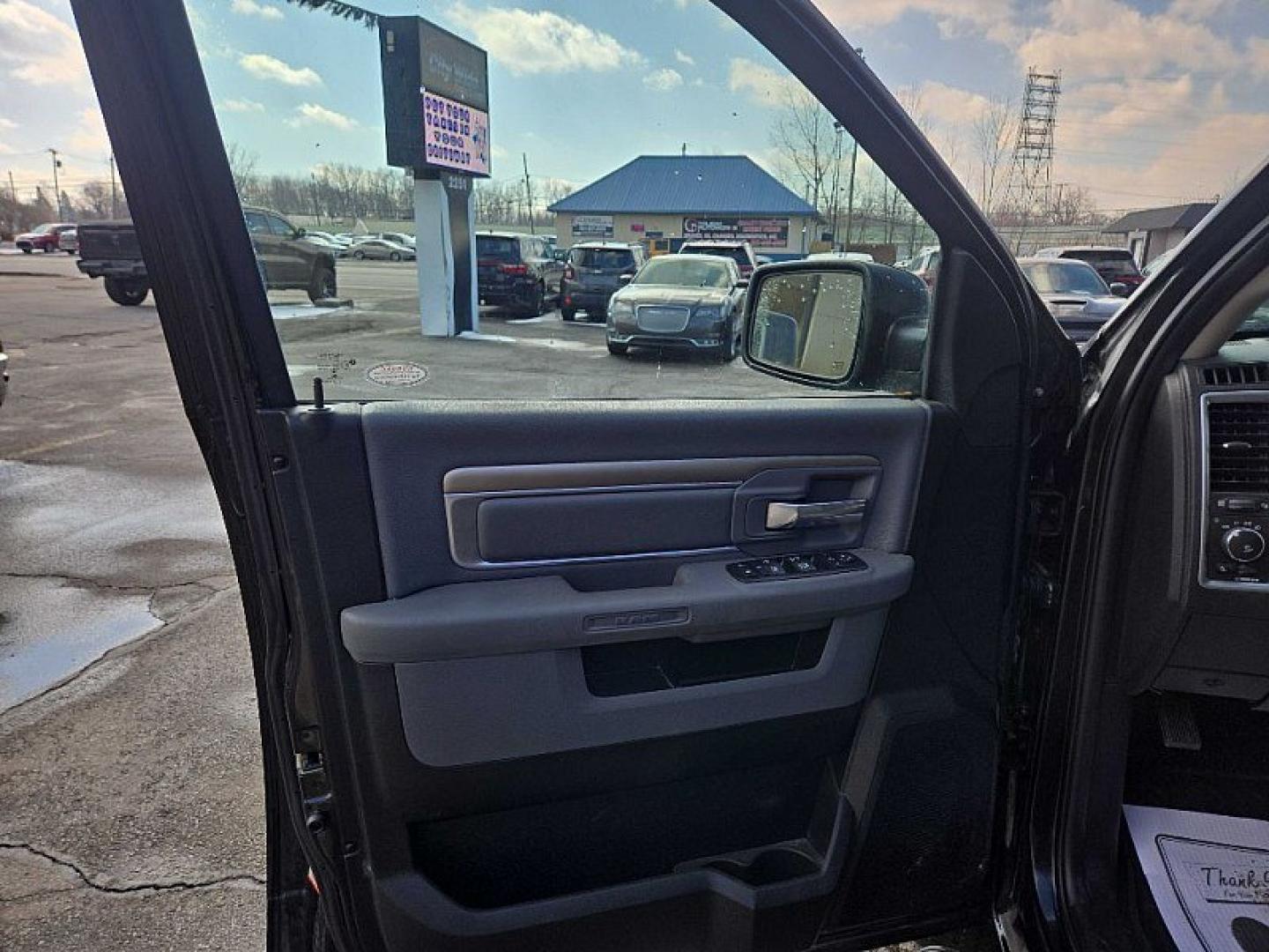 2017 BLACK /GRAY RAM 1500 SLT Quad Cab 4WD (1C6RR7GG1HS) with an 3.6L V6 DOHC 24V FFV engine, 8A transmission, located at 3304 Woodville Road, Northwood, OH, 43619, (419) 210-8019, 41.612694, -83.480743 - Your #1 Destination for Auto Loans and mdash;No Matter Your Credit!At our dealership, we believe everyone deserves the opportunity to drive their dream car and mdash;whether you have good credit, bad credit, or no credit at all. With a wide selection of hundreds of cars, trucks, and SUVs, you'll fin - Photo#8