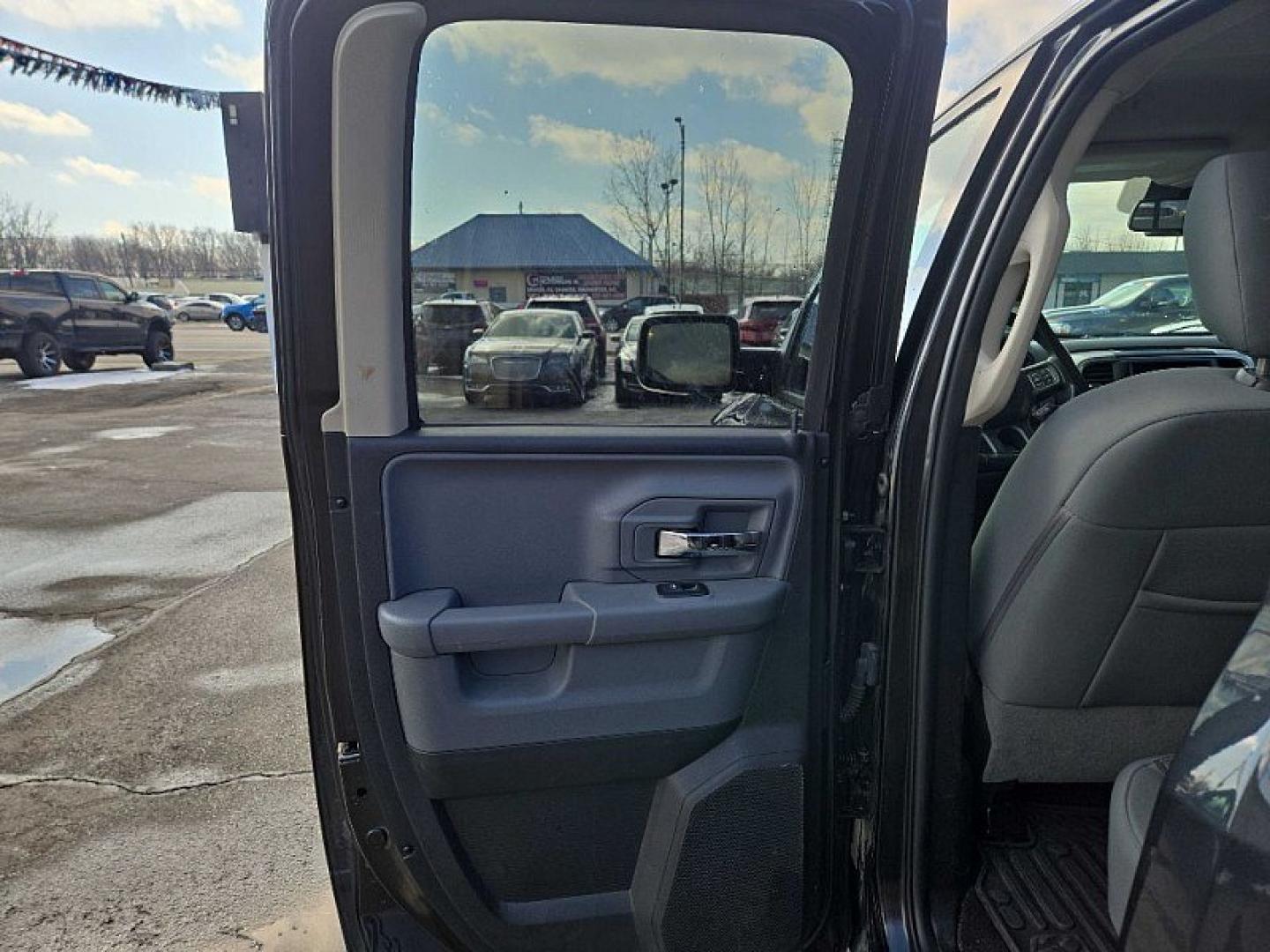2017 BLACK /GRAY RAM 1500 SLT Quad Cab 4WD (1C6RR7GG1HS) with an 3.6L V6 DOHC 24V FFV engine, 8A transmission, located at 3304 Woodville Road, Northwood, OH, 43619, (419) 210-8019, 41.612694, -83.480743 - Your #1 Destination for Auto Loans and mdash;No Matter Your Credit!At our dealership, we believe everyone deserves the opportunity to drive their dream car and mdash;whether you have good credit, bad credit, or no credit at all. With a wide selection of hundreds of cars, trucks, and SUVs, you'll fin - Photo#10