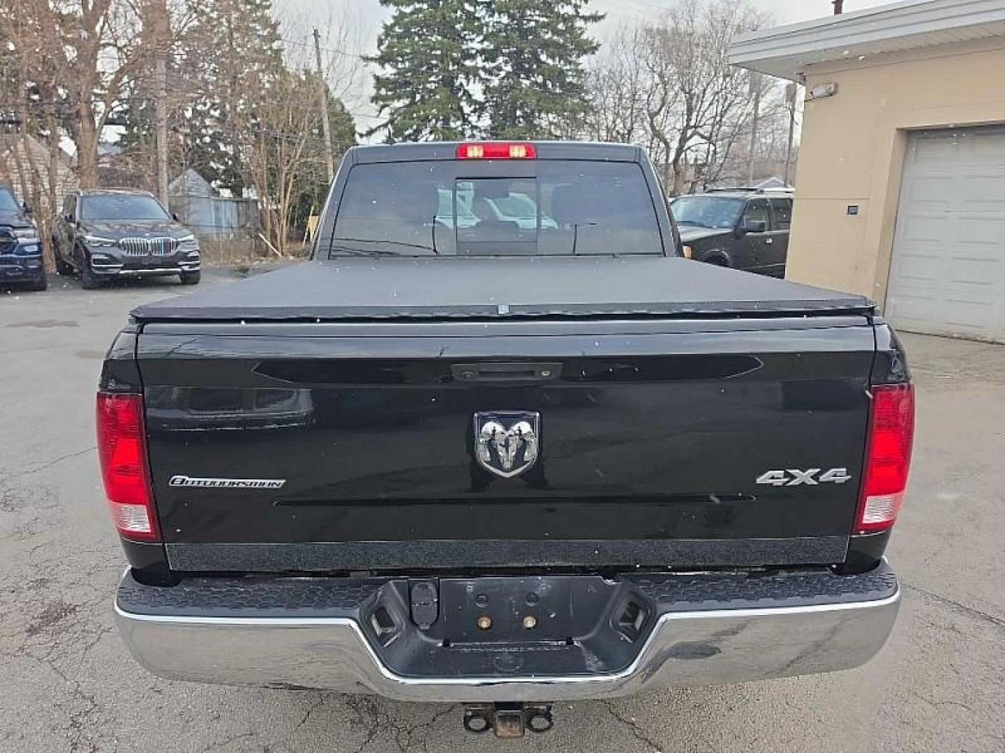 2018 BLACK /BLACK RAM 1500 SLT Crew Cab SWB 4WD (1C6RR7LMXJS) with an 3.0L V6 DIESEL engine, 8A transmission, located at 3304 Woodville Road, Northwood, OH, 43619, (419) 210-8019, 41.612694, -83.480743 - Your #1 Destination for Auto Loans and mdash;No Matter Your Credit!At our dealership, we believe everyone deserves the opportunity to drive their dream car and mdash;whether you have good credit, bad credit, or no credit at all. With a wide selection of hundreds of cars, trucks, and SUVs, you'll fin - Photo#3
