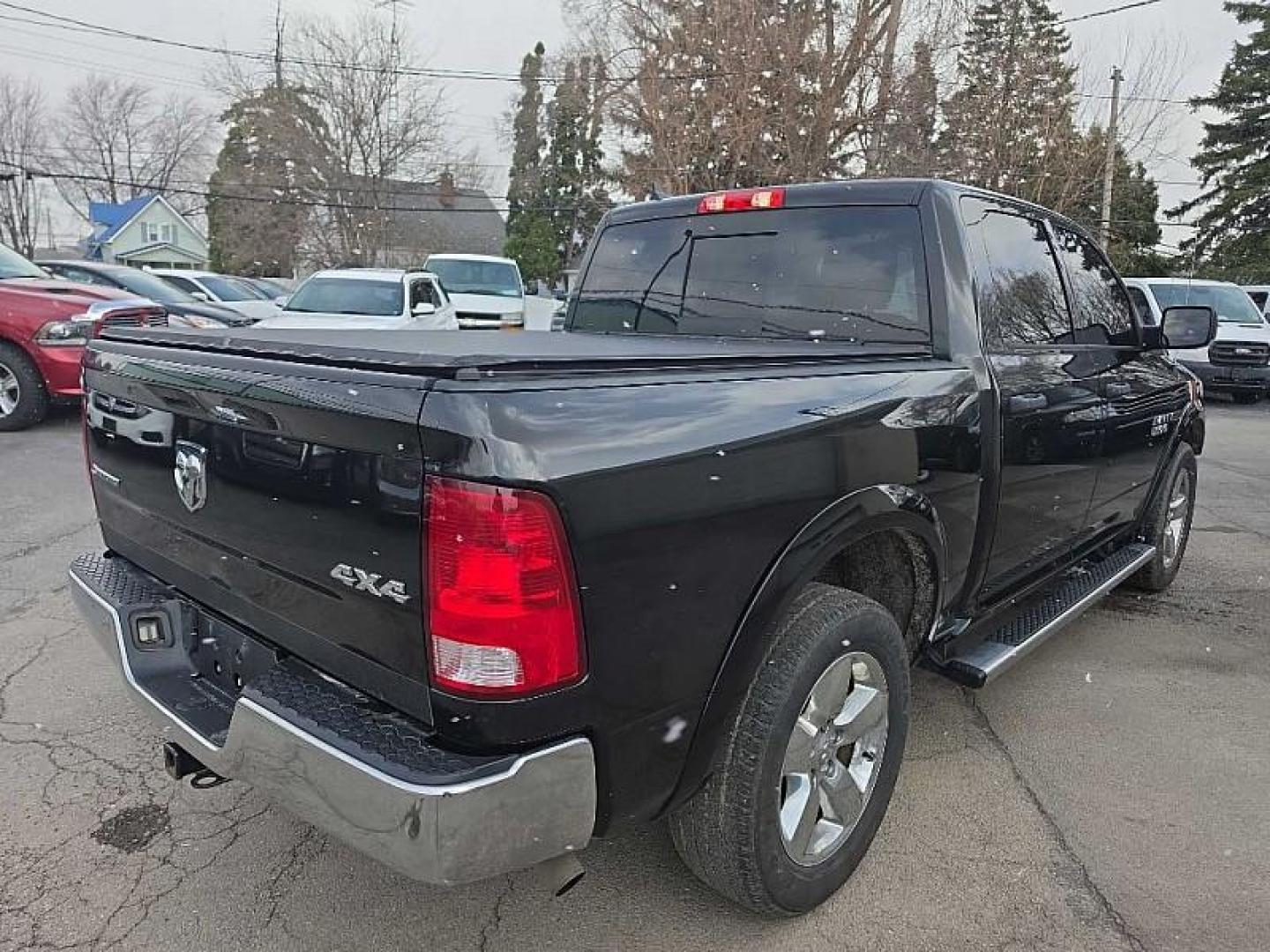 2018 BLACK /BLACK RAM 1500 SLT Crew Cab SWB 4WD (1C6RR7LMXJS) with an 3.0L V6 DIESEL engine, 8A transmission, located at 3304 Woodville Road, Northwood, OH, 43619, (419) 210-8019, 41.612694, -83.480743 - Your #1 Destination for Auto Loans and mdash;No Matter Your Credit!At our dealership, we believe everyone deserves the opportunity to drive their dream car and mdash;whether you have good credit, bad credit, or no credit at all. With a wide selection of hundreds of cars, trucks, and SUVs, you'll fin - Photo#4