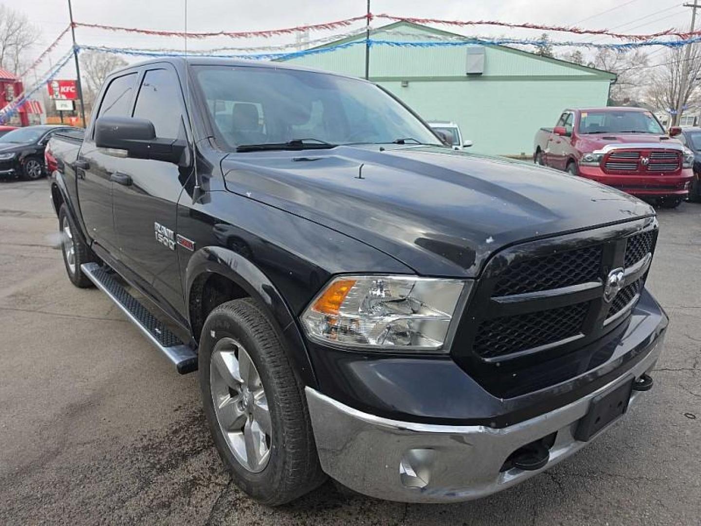 2018 BLACK /BLACK RAM 1500 SLT Crew Cab SWB 4WD (1C6RR7LMXJS) with an 3.0L V6 DIESEL engine, 8A transmission, located at 3304 Woodville Road, Northwood, OH, 43619, (419) 210-8019, 41.612694, -83.480743 - Your #1 Destination for Auto Loans and mdash;No Matter Your Credit!At our dealership, we believe everyone deserves the opportunity to drive their dream car and mdash;whether you have good credit, bad credit, or no credit at all. With a wide selection of hundreds of cars, trucks, and SUVs, you'll fin - Photo#6