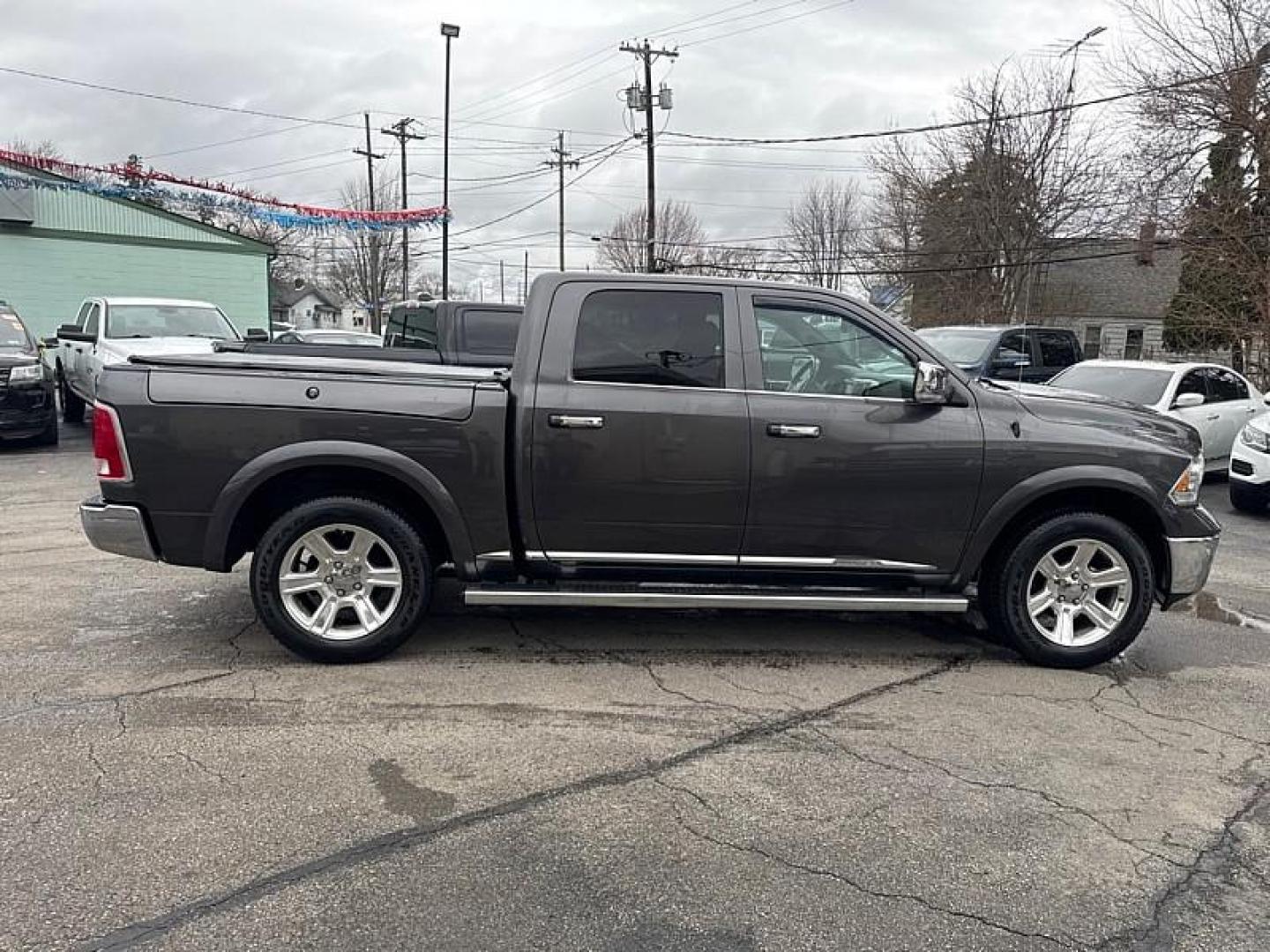2016 GRAY /BLACK RAM 1500 Longhorn Crew Cab SWB 4WD (1C6RR7PT2GS) with an 5.7L V8 OHV 16V engine, 6A transmission, located at 3304 Woodville Road, Northwood, OH, 43619, (419) 210-8019, 41.612694, -83.480743 - Your #1 Destination for Auto Loans and mdash;No Matter Your Credit!At our dealership, we believe everyone deserves the opportunity to drive their dream car and mdash;whether you have good credit, bad credit, or no credit at all. With a wide selection of hundreds of cars, trucks, and SUVs, you'll fin - Photo#5