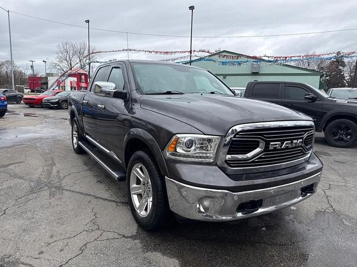 2016 GRAY /BLACK RAM 1500 Longhorn Crew Cab SWB 4WD (1C6RR7PT2GS) with an 5.7L V8 OHV 16V engine, 6A transmission, located at 3304 Woodville Road, Northwood, OH, 43619, (419) 210-8019, 41.612694, -83.480743 - Your #1 Destination for Auto Loans and mdash;No Matter Your Credit!At our dealership, we believe everyone deserves the opportunity to drive their dream car and mdash;whether you have good credit, bad credit, or no credit at all. With a wide selection of hundreds of cars, trucks, and SUVs, you'll fin - Photo#6