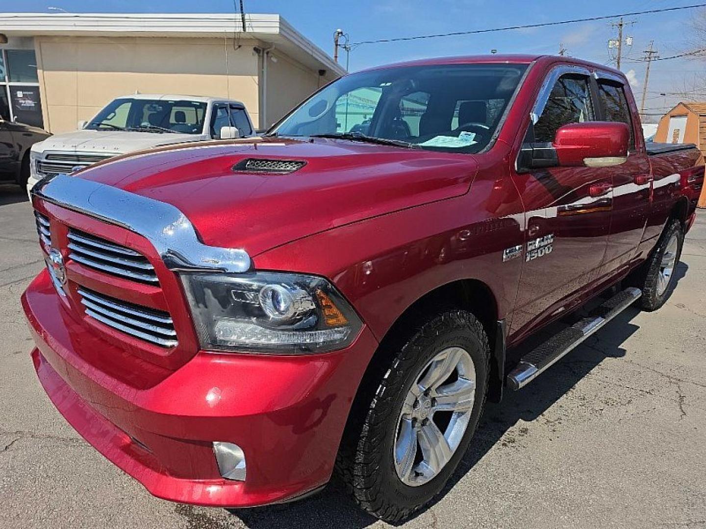 2014 RED /BLACK RAM 1500 Sport Quad Cab 4WD (1C6RR7HT3ES) with an 5.7L V8 OHV 16V engine, 6-Speed Automatic transmission, located at 3304 Woodville Road, Northwood, OH, 43619, (419) 210-8019, 41.612694, -83.480743 - Your #1 Destination for Auto Loans and mdash;No Matter Your Credit!At our dealership, we believe everyone deserves the opportunity to drive their dream car and mdash;whether you have good credit, bad credit, or no credit at all. With a wide selection of hundreds of cars, trucks, and SUVs, you'll fin - Photo#0