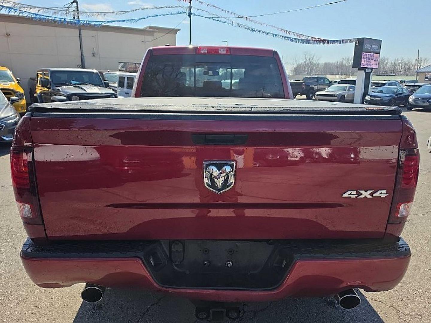 2014 RED /BLACK RAM 1500 Sport Quad Cab 4WD (1C6RR7HT3ES) with an 5.7L V8 OHV 16V engine, 6-Speed Automatic transmission, located at 3304 Woodville Road, Northwood, OH, 43619, (419) 210-8019, 41.612694, -83.480743 - Your #1 Destination for Auto Loans and mdash;No Matter Your Credit!At our dealership, we believe everyone deserves the opportunity to drive their dream car and mdash;whether you have good credit, bad credit, or no credit at all. With a wide selection of hundreds of cars, trucks, and SUVs, you'll fin - Photo#3