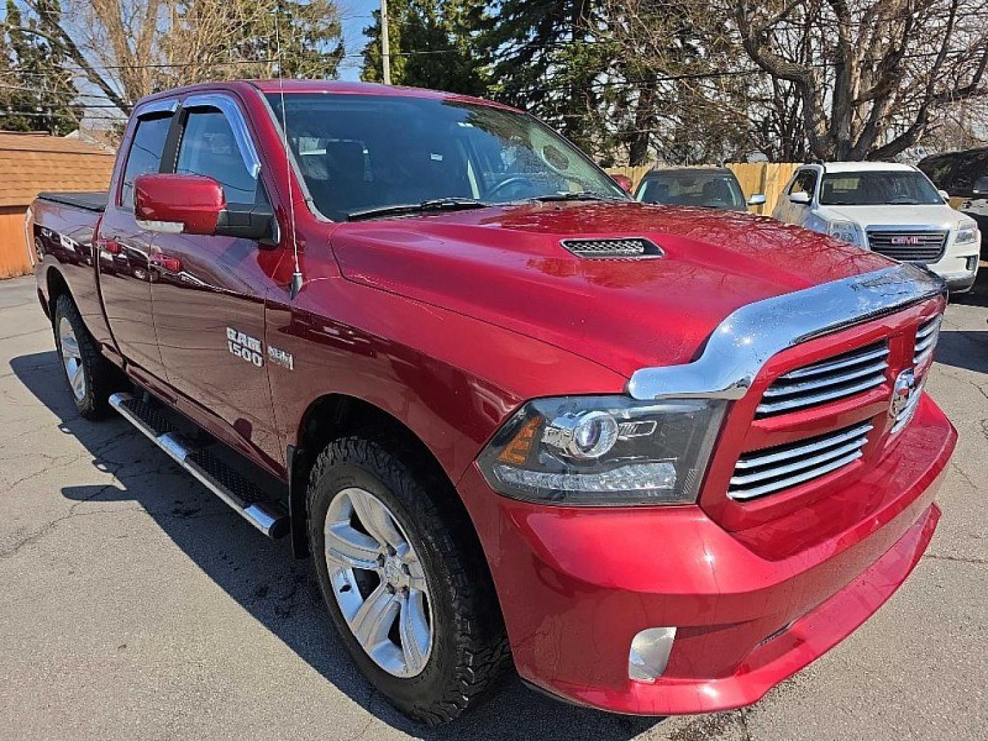2014 RED /BLACK RAM 1500 Sport Quad Cab 4WD (1C6RR7HT3ES) with an 5.7L V8 OHV 16V engine, 6-Speed Automatic transmission, located at 3304 Woodville Road, Northwood, OH, 43619, (419) 210-8019, 41.612694, -83.480743 - Your #1 Destination for Auto Loans and mdash;No Matter Your Credit!At our dealership, we believe everyone deserves the opportunity to drive their dream car and mdash;whether you have good credit, bad credit, or no credit at all. With a wide selection of hundreds of cars, trucks, and SUVs, you'll fin - Photo#6