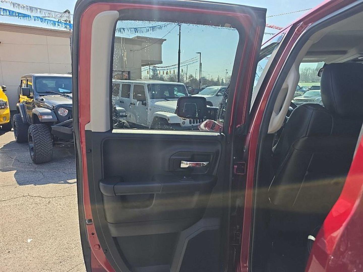 2014 RED /BLACK RAM 1500 Sport Quad Cab 4WD (1C6RR7HT3ES) with an 5.7L V8 OHV 16V engine, 6-Speed Automatic transmission, located at 3304 Woodville Road, Northwood, OH, 43619, (419) 210-8019, 41.612694, -83.480743 - Your #1 Destination for Auto Loans and mdash;No Matter Your Credit!At our dealership, we believe everyone deserves the opportunity to drive their dream car and mdash;whether you have good credit, bad credit, or no credit at all. With a wide selection of hundreds of cars, trucks, and SUVs, you'll fin - Photo#10