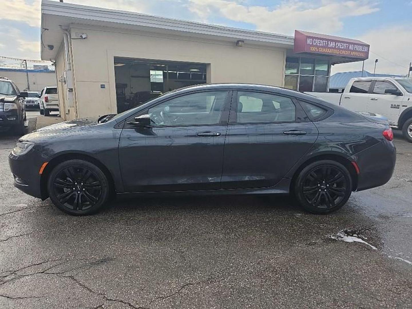 2017 GRAY /BLACK Chrysler 200 LX (1C3CCCFB6HN) with an 2.4L L4 DOHC 16V engine, 9A transmission, located at 3304 Woodville Road, Northwood, OH, 43619, (419) 210-8019, 41.612694, -83.480743 - Your #1 Destination for Auto Loans and mdash;No Matter Your Credit!At our dealership, we believe everyone deserves the opportunity to drive their dream car and mdash;whether you have good credit, bad credit, or no credit at all. With a wide selection of hundreds of cars, trucks, and SUVs, you'll fin - Photo#2