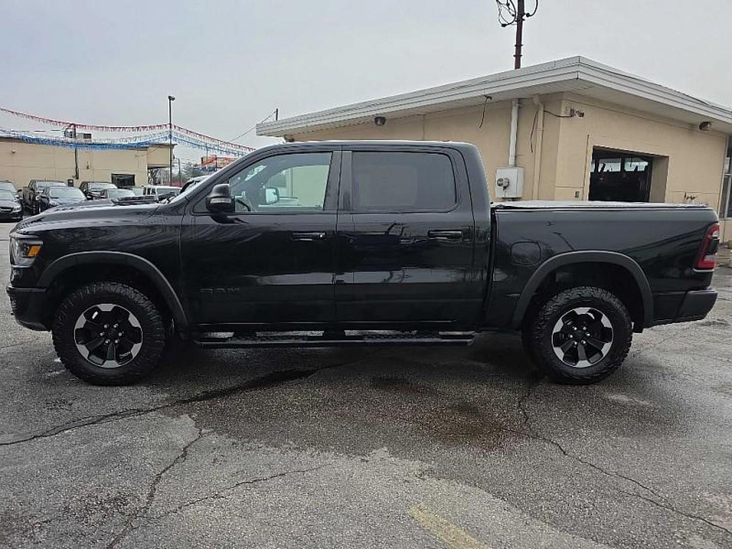 2020 BLACK /BLACK RAM 1500 Rebel Crew Cab SB 4WD (1C6SRFLMXLN) with an 3.5L V6 DOHC 24V engine, 8A transmission, located at 3304 Woodville Road, Northwood, OH, 43619, (419) 210-8019, 41.612694, -83.480743 - Your #1 Destination for Auto Loans and mdash;No Matter Your Credit!At our dealership, we believe everyone deserves the opportunity to drive their dream car and mdash;whether you have good credit, bad credit, or no credit at all. With a wide selection of hundreds of cars, trucks, and SUVs, you'll fin - Photo#1