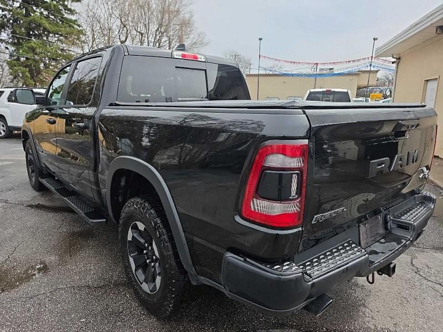 2020 BLACK /BLACK RAM 1500 Rebel Crew Cab SB 4WD (1C6SRFLMXLN) with an 3.5L V6 DOHC 24V engine, 8A transmission, located at 3304 Woodville Road, Northwood, OH, 43619, (419) 210-8019, 41.612694, -83.480743 - Your #1 Destination for Auto Loans and mdash;No Matter Your Credit!At our dealership, we believe everyone deserves the opportunity to drive their dream car and mdash;whether you have good credit, bad credit, or no credit at all. With a wide selection of hundreds of cars, trucks, and SUVs, you'll fin - Photo#2