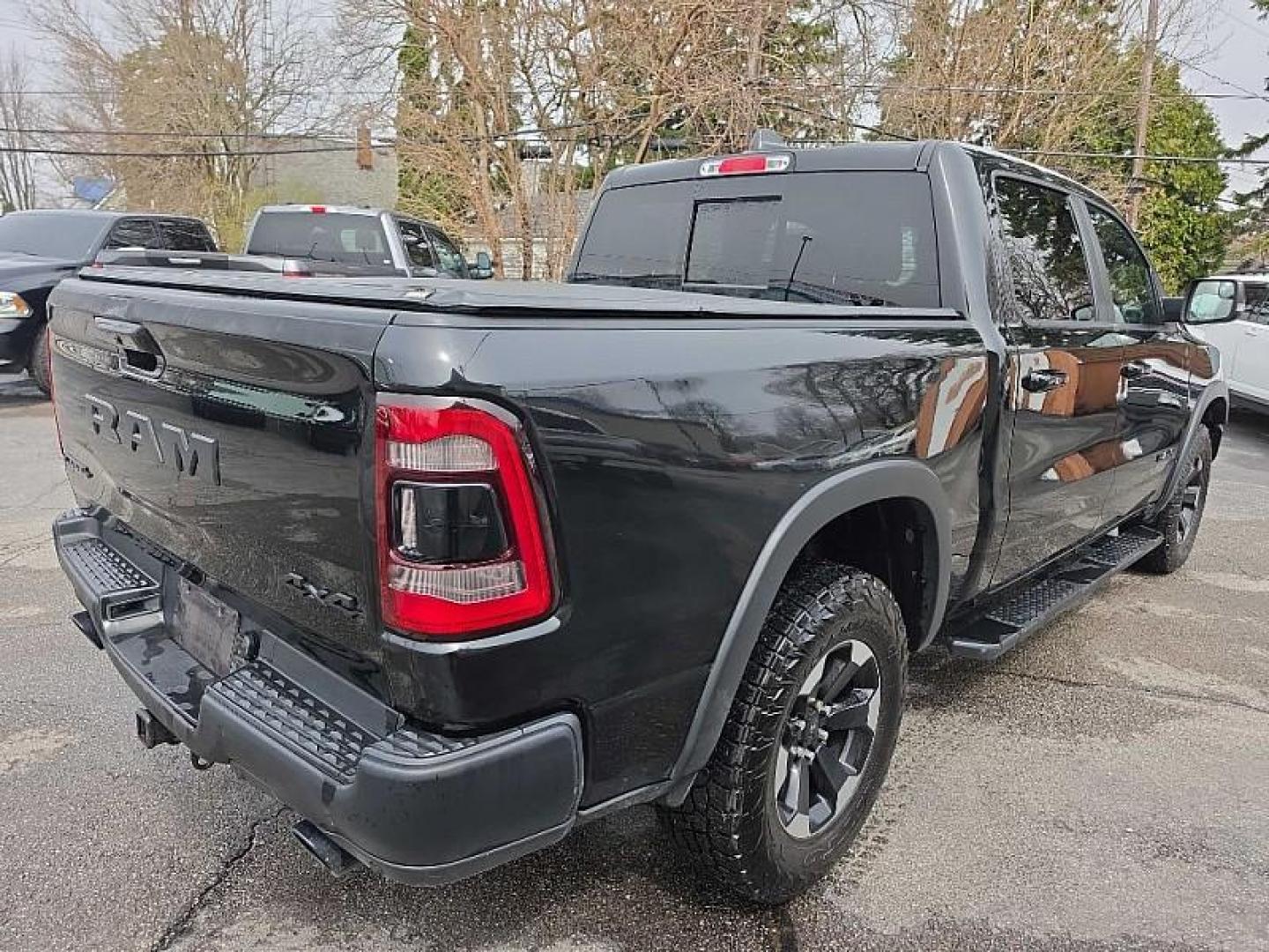 2020 BLACK /BLACK RAM 1500 Rebel Crew Cab SB 4WD (1C6SRFLMXLN) with an 3.5L V6 DOHC 24V engine, 8A transmission, located at 3304 Woodville Road, Northwood, OH, 43619, (419) 210-8019, 41.612694, -83.480743 - Your #1 Destination for Auto Loans and mdash;No Matter Your Credit!At our dealership, we believe everyone deserves the opportunity to drive their dream car and mdash;whether you have good credit, bad credit, or no credit at all. With a wide selection of hundreds of cars, trucks, and SUVs, you'll fin - Photo#4