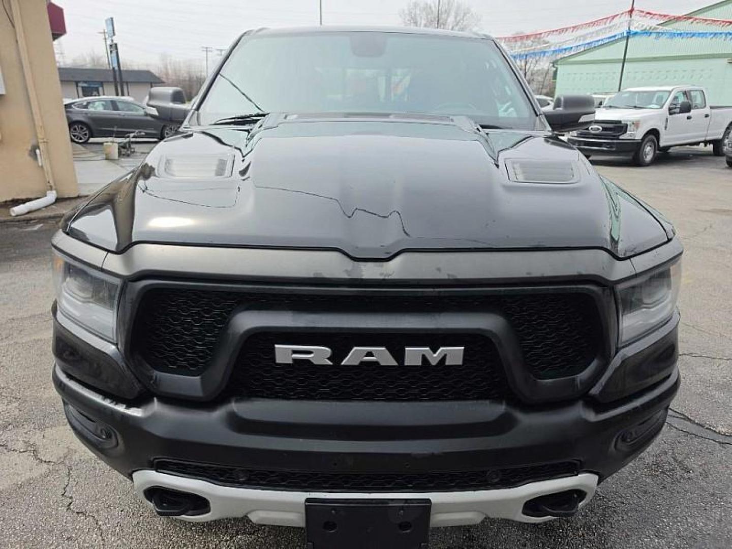 2020 BLACK /BLACK RAM 1500 Rebel Crew Cab SB 4WD (1C6SRFLMXLN) with an 3.5L V6 DOHC 24V engine, 8A transmission, located at 3304 Woodville Road, Northwood, OH, 43619, (419) 210-8019, 41.612694, -83.480743 - Your #1 Destination for Auto Loans and mdash;No Matter Your Credit!At our dealership, we believe everyone deserves the opportunity to drive their dream car and mdash;whether you have good credit, bad credit, or no credit at all. With a wide selection of hundreds of cars, trucks, and SUVs, you'll fin - Photo#7