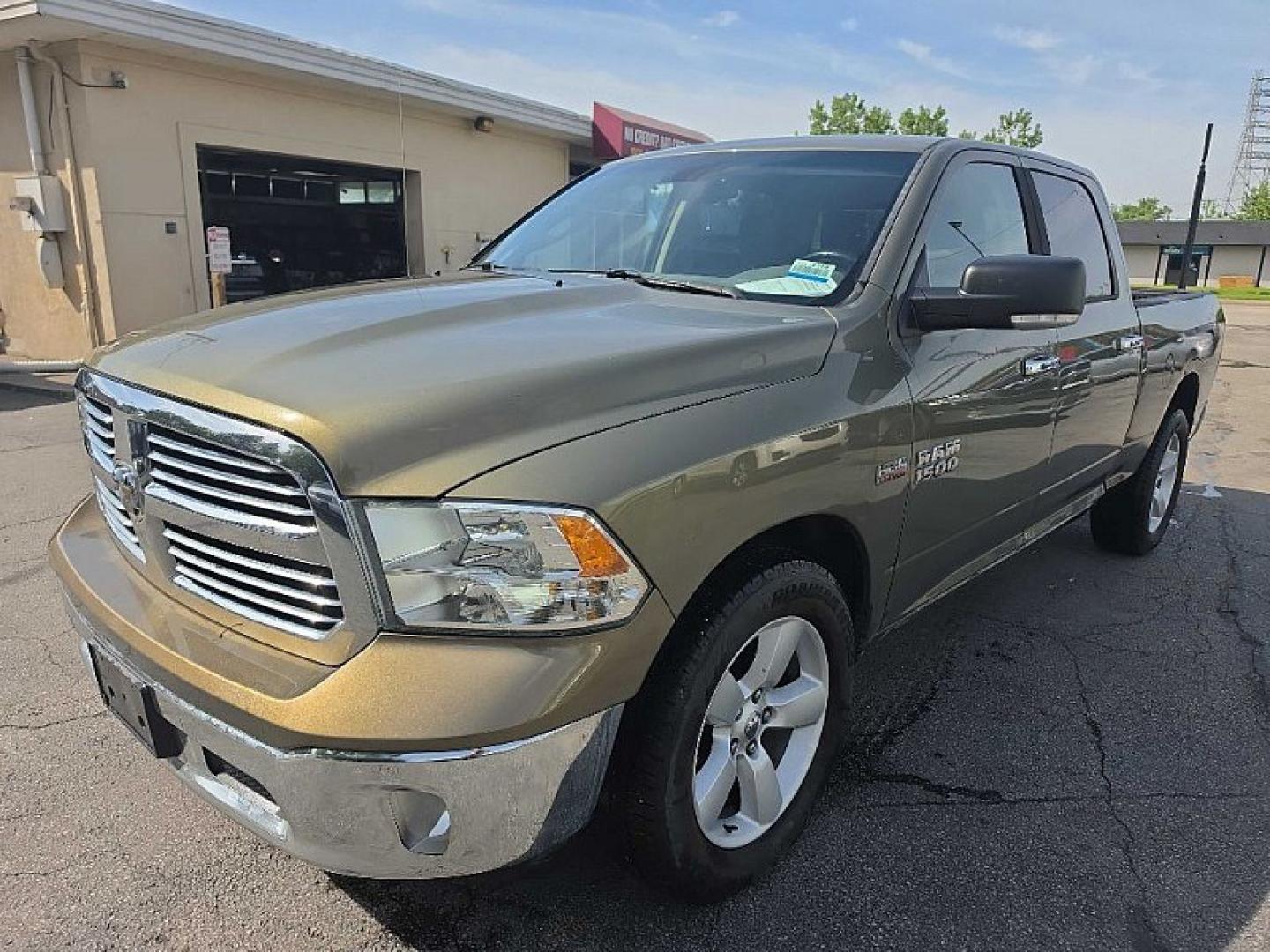 2015 TAN /GRAY RAM 1500 SLT Crew Cab LWB 4WD (1C6RR7TT3FS) with an 5.7L V8 OHV 16V engine, 6-Speed Automatic transmission, located at 3304 Woodville Road, Northwood, OH, 43619, (419) 210-8019, 41.612694, -83.480743 - Your #1 Destination for Auto Loans and mdash;No Matter Your Credit!At our dealership, we believe everyone deserves the opportunity to drive their dream car and mdash;whether you have good credit, bad credit, or no credit at all. With a wide selection of hundreds of cars, trucks, and SUVs, you'll fin - Photo#0