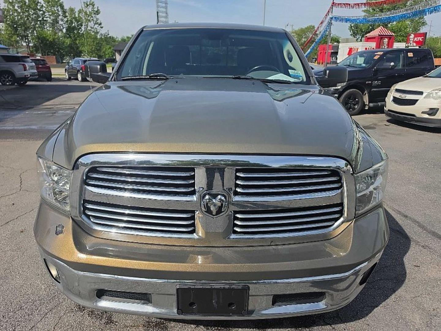 2015 TAN /GRAY RAM 1500 SLT Crew Cab LWB 4WD (1C6RR7TT3FS) with an 5.7L V8 OHV 16V engine, 6-Speed Automatic transmission, located at 3304 Woodville Road, Northwood, OH, 43619, (419) 210-8019, 41.612694, -83.480743 - Your #1 Destination for Auto Loans and mdash;No Matter Your Credit!At our dealership, we believe everyone deserves the opportunity to drive their dream car and mdash;whether you have good credit, bad credit, or no credit at all. With a wide selection of hundreds of cars, trucks, and SUVs, you'll fin - Photo#7