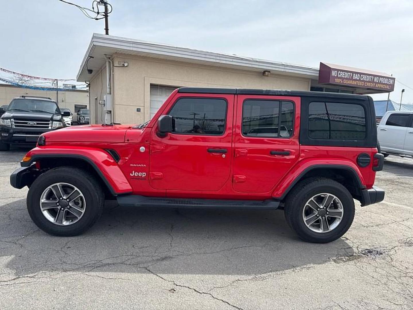 2020 RED /BLACK Jeep Wrangler Unlimited Sahara (1C4HJXEN7LW) with an 2.0L L4 DOHC 16V TURBO engine, 6A transmission, located at 3304 Woodville Road, Northwood, OH, 43619, (419) 210-8019, 41.612694, -83.480743 - Your #1 Destination for Auto Loans and mdash;No Matter Your Credit!At our dealership, we believe everyone deserves the opportunity to drive their dream car and mdash;whether you have good credit, bad credit, or no credit at all. With a wide selection of hundreds of cars, trucks, and SUVs, you'll fin - Photo#1