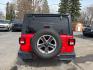 2020 RED /BLACK Jeep Wrangler Unlimited Sahara (1C4HJXEN7LW) with an 2.0L L4 DOHC 16V TURBO engine, 6A transmission, located at 3304 Woodville Road, Northwood, OH, 43619, (419) 210-8019, 41.612694, -83.480743 - Your #1 Destination for Auto Loans and mdash;No Matter Your Credit!At our dealership, we believe everyone deserves the opportunity to drive their dream car and mdash;whether you have good credit, bad credit, or no credit at all. With a wide selection of hundreds of cars, trucks, and SUVs, you'll fin - Photo#3