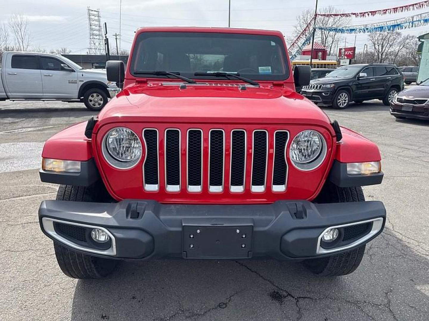 2020 RED /BLACK Jeep Wrangler Unlimited Sahara (1C4HJXEN7LW) with an 2.0L L4 DOHC 16V TURBO engine, 6A transmission, located at 3304 Woodville Road, Northwood, OH, 43619, (419) 210-8019, 41.612694, -83.480743 - Your #1 Destination for Auto Loans and mdash;No Matter Your Credit!At our dealership, we believe everyone deserves the opportunity to drive their dream car and mdash;whether you have good credit, bad credit, or no credit at all. With a wide selection of hundreds of cars, trucks, and SUVs, you'll fin - Photo#7