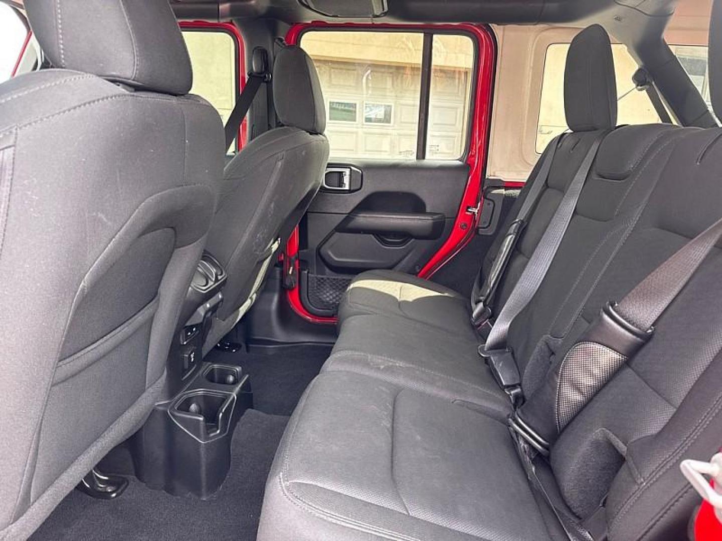 2020 RED /BLACK Jeep Wrangler Unlimited Sahara (1C4HJXEN7LW) with an 2.0L L4 DOHC 16V TURBO engine, 6A transmission, located at 3304 Woodville Road, Northwood, OH, 43619, (419) 210-8019, 41.612694, -83.480743 - Your #1 Destination for Auto Loans and mdash;No Matter Your Credit!At our dealership, we believe everyone deserves the opportunity to drive their dream car and mdash;whether you have good credit, bad credit, or no credit at all. With a wide selection of hundreds of cars, trucks, and SUVs, you'll fin - Photo#11