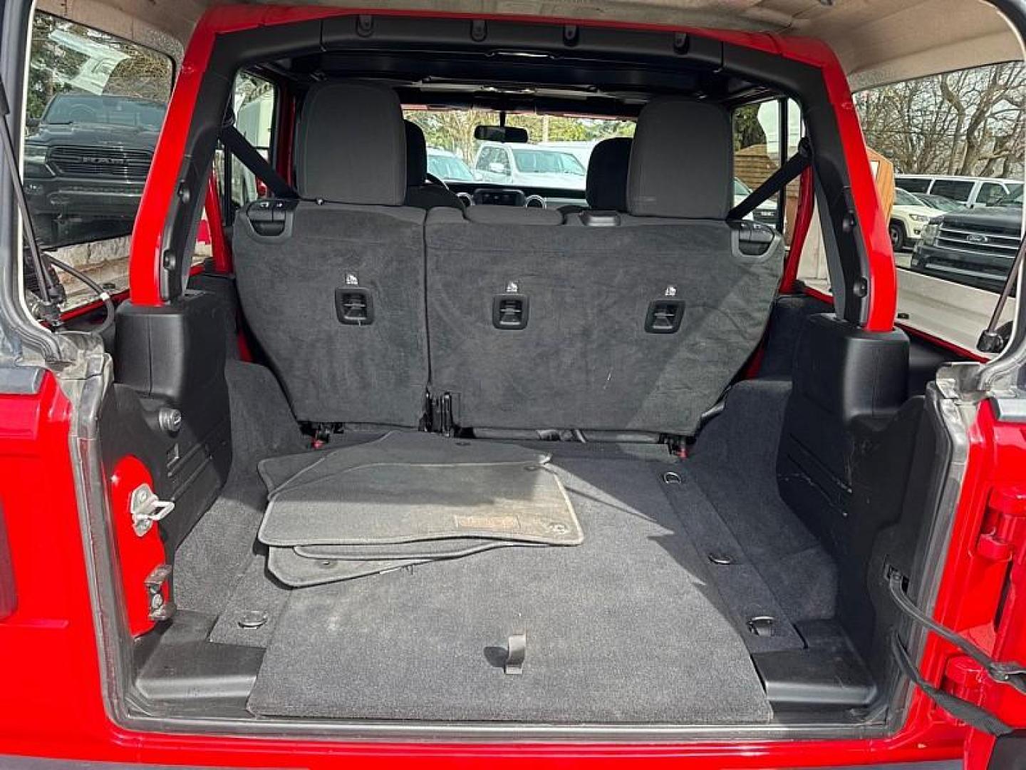 2020 RED /BLACK Jeep Wrangler Unlimited Sahara (1C4HJXEN7LW) with an 2.0L L4 DOHC 16V TURBO engine, 6A transmission, located at 3304 Woodville Road, Northwood, OH, 43619, (419) 210-8019, 41.612694, -83.480743 - Your #1 Destination for Auto Loans and mdash;No Matter Your Credit!At our dealership, we believe everyone deserves the opportunity to drive their dream car and mdash;whether you have good credit, bad credit, or no credit at all. With a wide selection of hundreds of cars, trucks, and SUVs, you'll fin - Photo#12