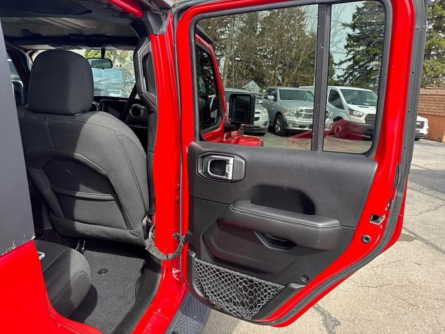 2020 RED /BLACK Jeep Wrangler Unlimited Sahara (1C4HJXEN7LW) with an 2.0L L4 DOHC 16V TURBO engine, 6A transmission, located at 3304 Woodville Road, Northwood, OH, 43619, (419) 210-8019, 41.612694, -83.480743 - Your #1 Destination for Auto Loans and mdash;No Matter Your Credit!At our dealership, we believe everyone deserves the opportunity to drive their dream car and mdash;whether you have good credit, bad credit, or no credit at all. With a wide selection of hundreds of cars, trucks, and SUVs, you'll fin - Photo#13