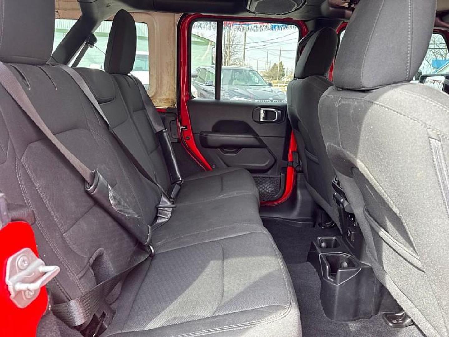 2020 RED /BLACK Jeep Wrangler Unlimited Sahara (1C4HJXEN7LW) with an 2.0L L4 DOHC 16V TURBO engine, 6A transmission, located at 3304 Woodville Road, Northwood, OH, 43619, (419) 210-8019, 41.612694, -83.480743 - Your #1 Destination for Auto Loans and mdash;No Matter Your Credit!At our dealership, we believe everyone deserves the opportunity to drive their dream car and mdash;whether you have good credit, bad credit, or no credit at all. With a wide selection of hundreds of cars, trucks, and SUVs, you'll fin - Photo#14