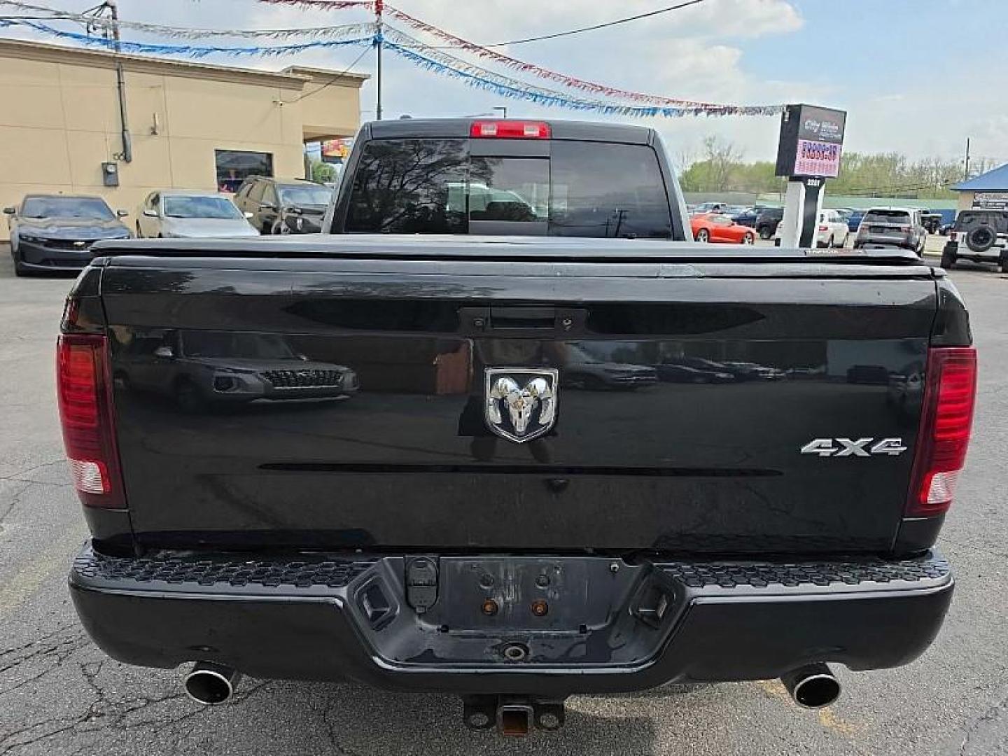 2016 BLACK /BLACK RAM 1500 Sport Quad Cab 4WD (1C6RR7HT0GS) with an 5.7L V8 OHV 16V engine, 6A transmission, located at 3304 Woodville Road, Northwood, OH, 43619, (419) 210-8019, 41.612694, -83.480743 - Your #1 Destination for Auto Loans and mdash;No Matter Your Credit!At our dealership, we believe everyone deserves the opportunity to drive their dream car and mdash;whether you have good credit, bad credit, or no credit at all. With a wide selection of hundreds of cars, trucks, and SUVs, you'll fin - Photo#3
