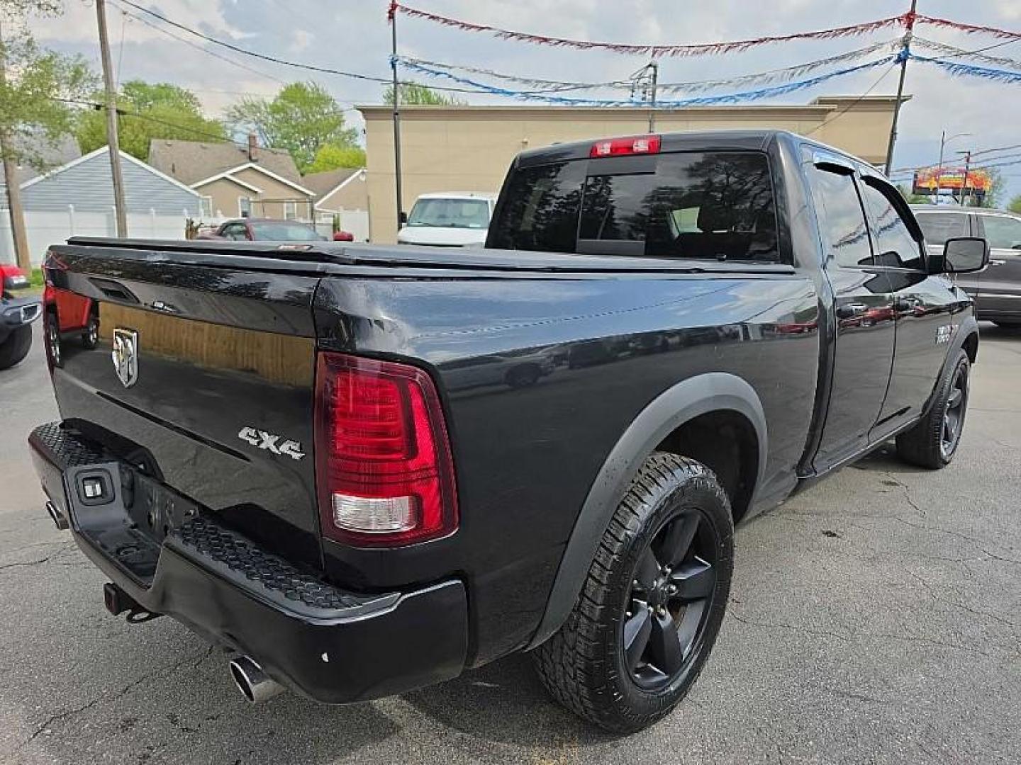 2016 BLACK /BLACK RAM 1500 Sport Quad Cab 4WD (1C6RR7HT0GS) with an 5.7L V8 OHV 16V engine, 6A transmission, located at 3304 Woodville Road, Northwood, OH, 43619, (419) 210-8019, 41.612694, -83.480743 - Your #1 Destination for Auto Loans and mdash;No Matter Your Credit!At our dealership, we believe everyone deserves the opportunity to drive their dream car and mdash;whether you have good credit, bad credit, or no credit at all. With a wide selection of hundreds of cars, trucks, and SUVs, you'll fin - Photo#4