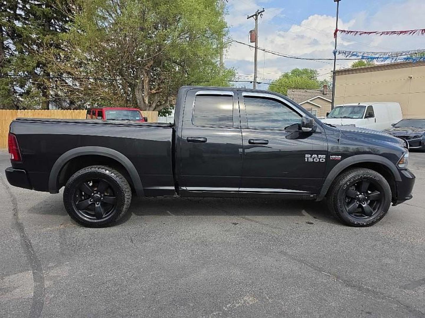 2016 BLACK /BLACK RAM 1500 Sport Quad Cab 4WD (1C6RR7HT0GS) with an 5.7L V8 OHV 16V engine, 6A transmission, located at 3304 Woodville Road, Northwood, OH, 43619, (419) 210-8019, 41.612694, -83.480743 - Your #1 Destination for Auto Loans and mdash;No Matter Your Credit!At our dealership, we believe everyone deserves the opportunity to drive their dream car and mdash;whether you have good credit, bad credit, or no credit at all. With a wide selection of hundreds of cars, trucks, and SUVs, you'll fin - Photo#5