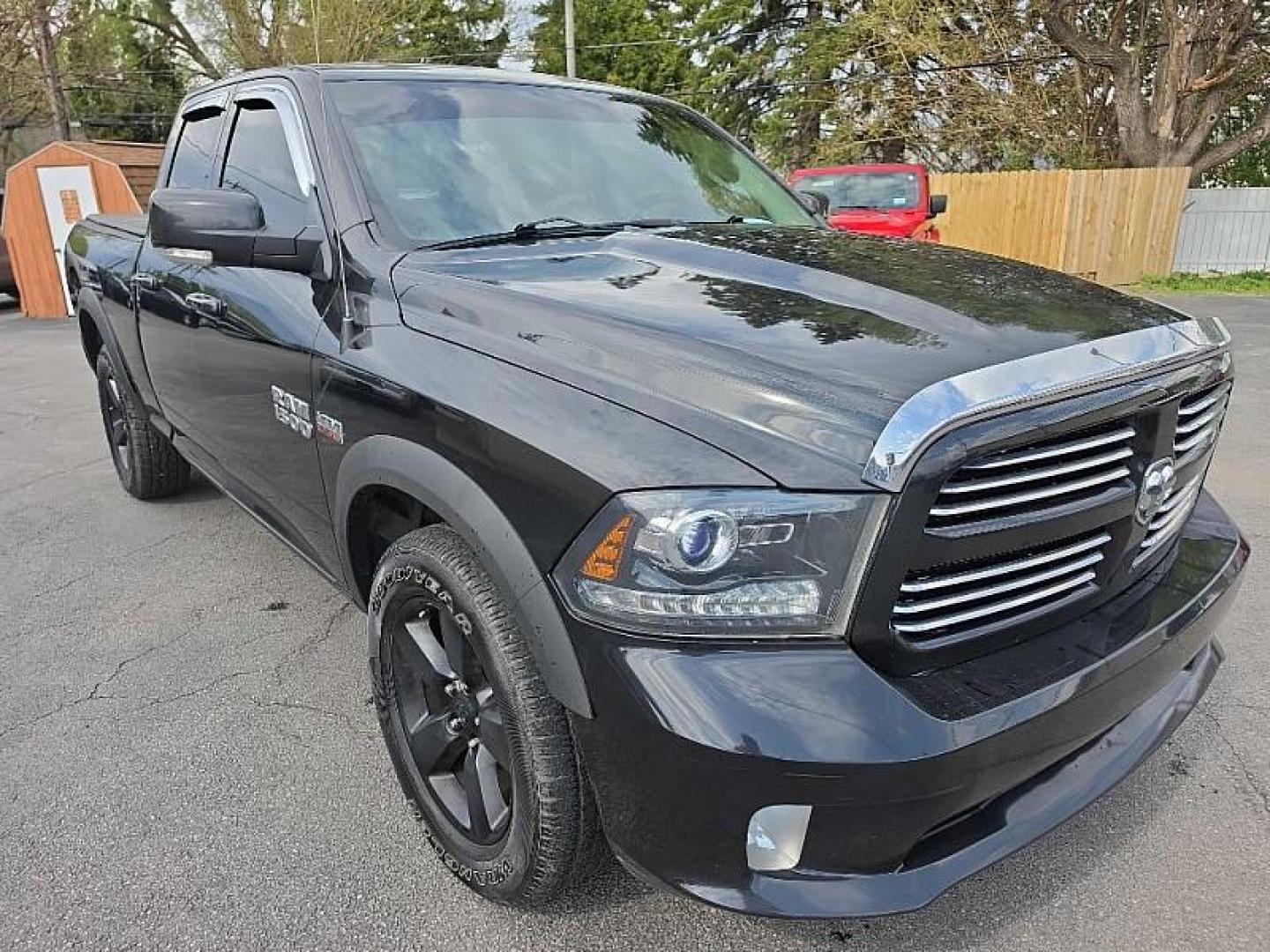 2016 BLACK /BLACK RAM 1500 Sport Quad Cab 4WD (1C6RR7HT0GS) with an 5.7L V8 OHV 16V engine, 6A transmission, located at 3304 Woodville Road, Northwood, OH, 43619, (419) 210-8019, 41.612694, -83.480743 - Your #1 Destination for Auto Loans and mdash;No Matter Your Credit!At our dealership, we believe everyone deserves the opportunity to drive their dream car and mdash;whether you have good credit, bad credit, or no credit at all. With a wide selection of hundreds of cars, trucks, and SUVs, you'll fin - Photo#6