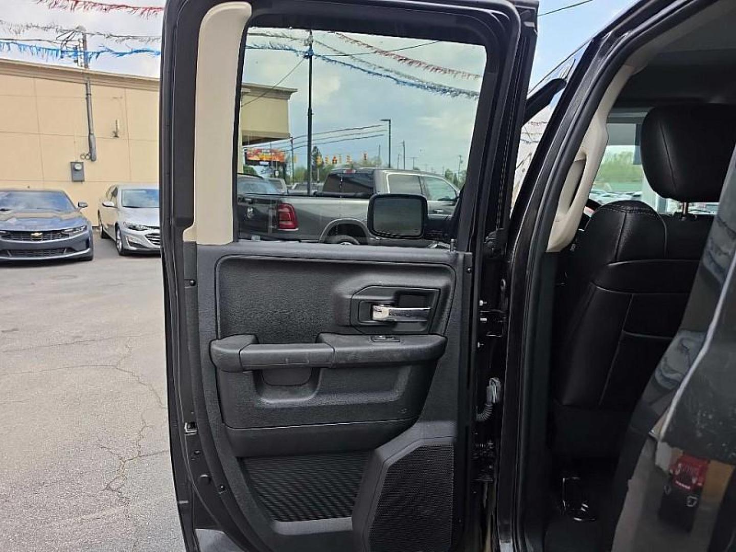 2016 BLACK /BLACK RAM 1500 Sport Quad Cab 4WD (1C6RR7HT0GS) with an 5.7L V8 OHV 16V engine, 6A transmission, located at 3304 Woodville Road, Northwood, OH, 43619, (419) 210-8019, 41.612694, -83.480743 - Your #1 Destination for Auto Loans and mdash;No Matter Your Credit!At our dealership, we believe everyone deserves the opportunity to drive their dream car and mdash;whether you have good credit, bad credit, or no credit at all. With a wide selection of hundreds of cars, trucks, and SUVs, you'll fin - Photo#10