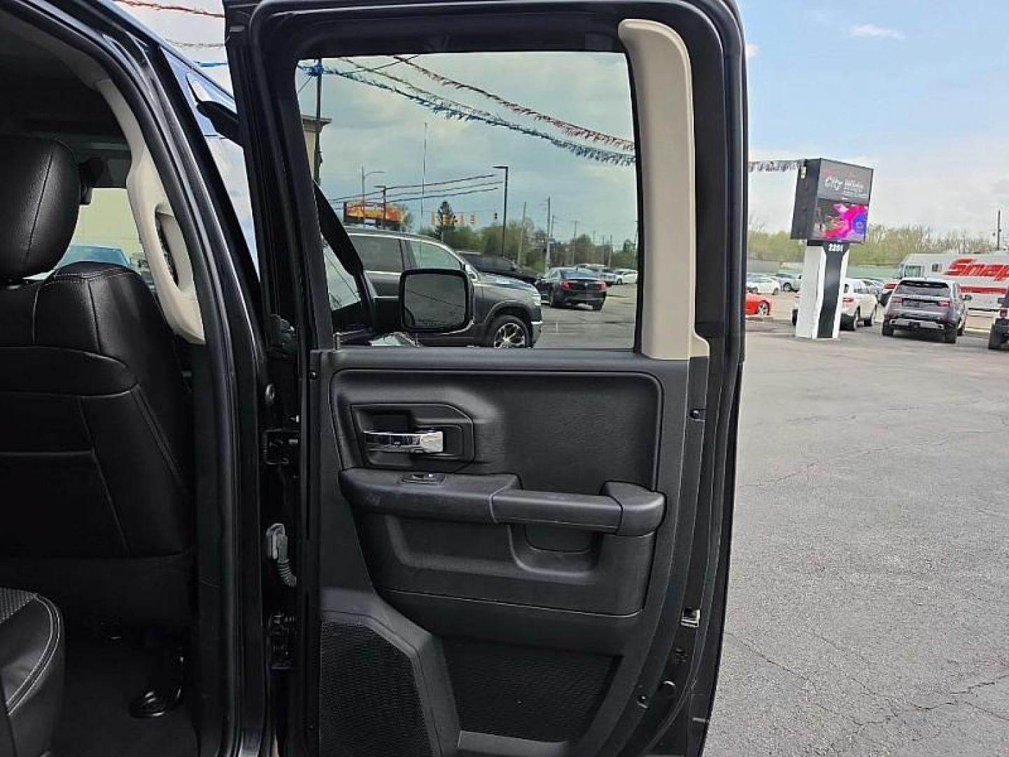 2016 BLACK /BLACK RAM 1500 Sport Quad Cab 4WD (1C6RR7HT0GS) with an 5.7L V8 OHV 16V engine, 6A transmission, located at 3304 Woodville Road, Northwood, OH, 43619, (419) 210-8019, 41.612694, -83.480743 - Your #1 Destination for Auto Loans and mdash;No Matter Your Credit!At our dealership, we believe everyone deserves the opportunity to drive their dream car and mdash;whether you have good credit, bad credit, or no credit at all. With a wide selection of hundreds of cars, trucks, and SUVs, you'll fin - Photo#12