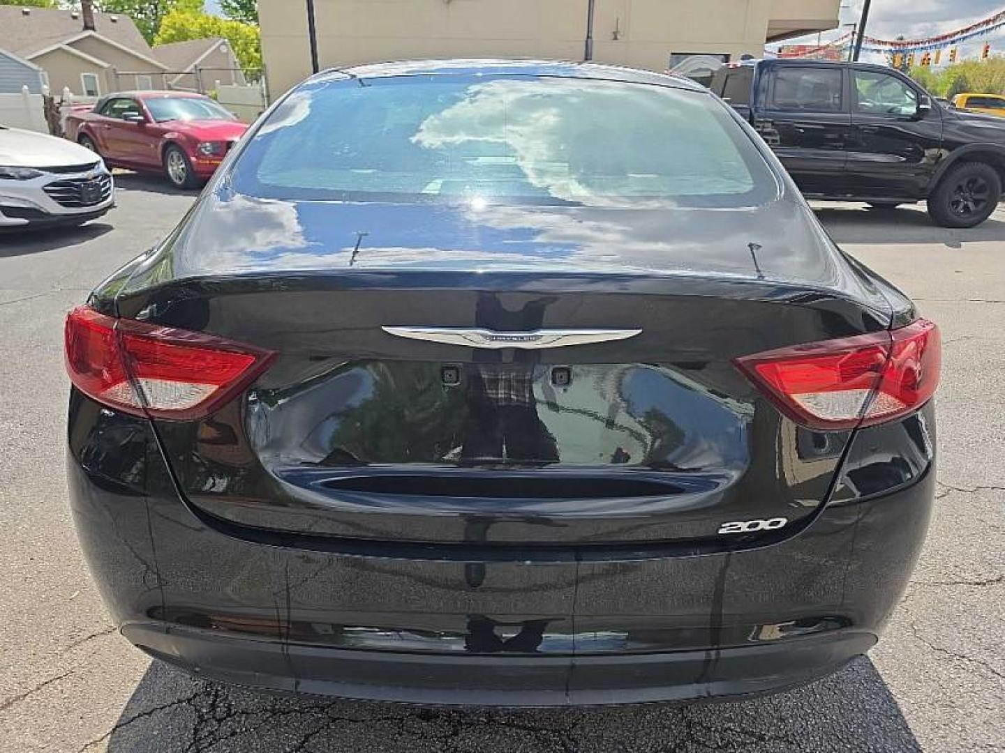 2016 BLACK /BLACK Chrysler 200 LX (1C3CCCFB8GN) with an 2.4L L4 DOHC 16V engine, 9A transmission, located at 3304 Woodville Road, Northwood, OH, 43619, (419) 210-8019, 41.612694, -83.480743 - Your #1 Destination for Auto Loans and mdash;No Matter Your Credit!At our dealership, we believe everyone deserves the opportunity to drive their dream car and mdash;whether you have good credit, bad credit, or no credit at all. With a wide selection of hundreds of cars, trucks, and SUVs, you'll fin - Photo#3